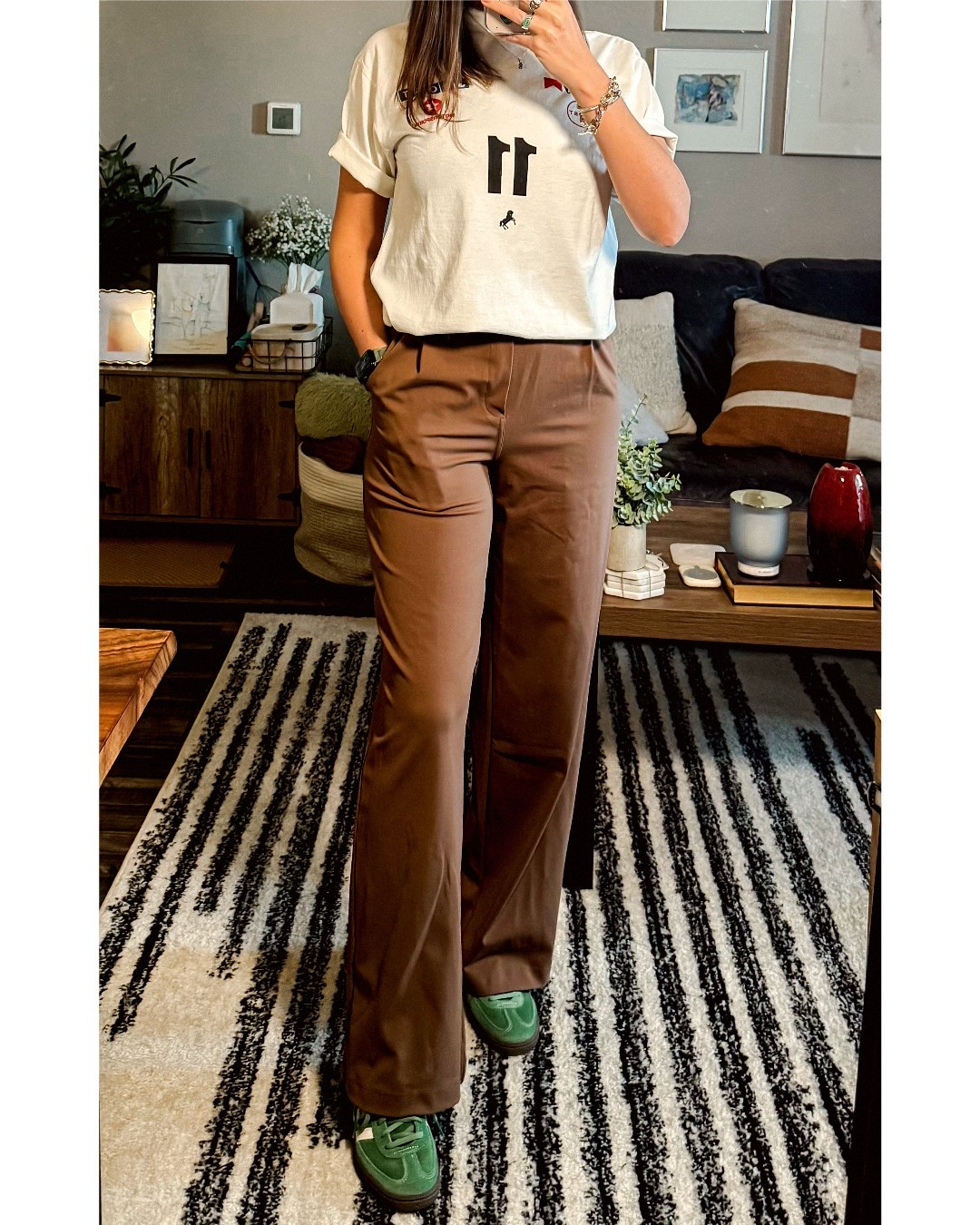 Sporty, comfy, and elevated — this spring look is a fave! Styled this graphic tee with high-waisted trousers and green Adidas sneakers for a cool-girl vibe. Easy to wear, easy to love.

Shop the full look on my LTK: trousers, sneakers & similar tees all linked!

#springoutfit #sportychic #adidasstyle #trouseroutfit #elevatedcasual

#LTKFindsUnder50 #LTKFindsUnder100 #LTKShoeCrush