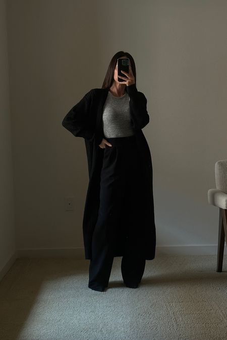Minimal business chic outfit 
Long cardigan 
Bodysuit 
Trousers 