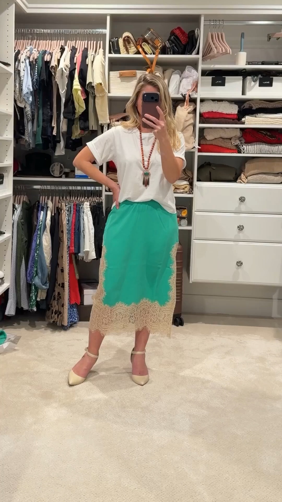 Effortless outfit formula I keep coming back to.

A simple white tee paired with a satin midi skirt is one of my favorite ways to mix casual and elevated pieces. The tee keeps it relaxed while the skirt adds a little polish, making it perfect for lunch, meetings, or an evening out.

Finished it off with a statement necklace to pull everything together. Everything is linked in LTK. ✨

#LTKPetite #LTKSeasonal #LTKootd