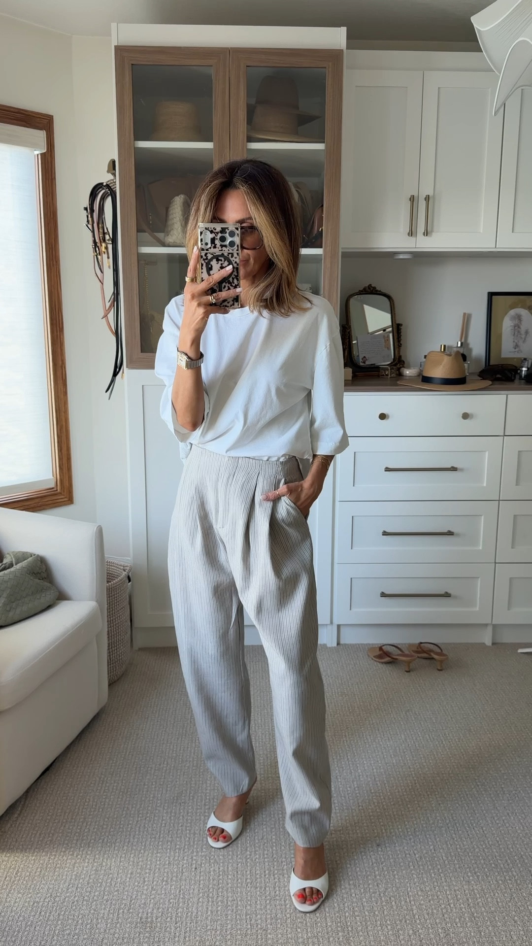 Zara linen striped trousers, love the pleats and slight barrel silhouette, adds a bit of menswear touch - oversized tee all size xs

#LTKOver40 #LTKSeasonal #LTKootd

#LTKgrwm #LTKootd #LTKSeasonal