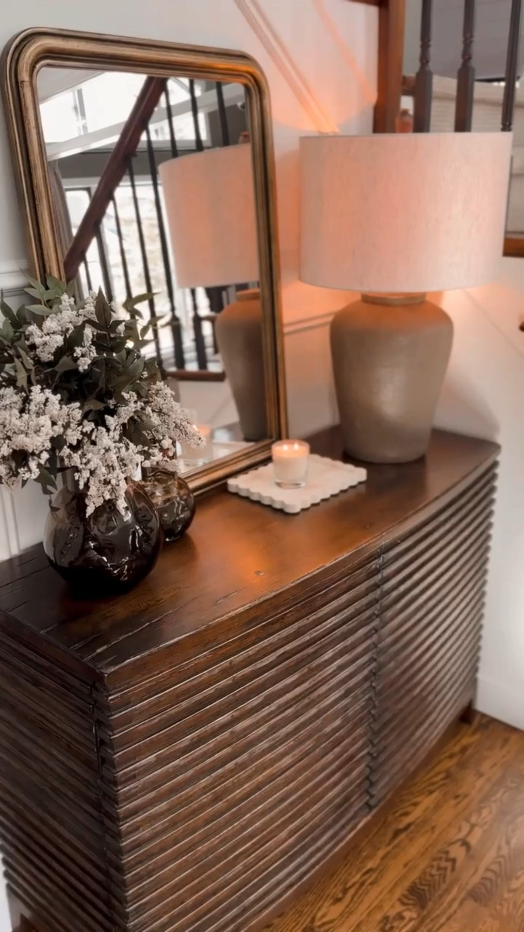 Living our new entry way cabinet decor! I wasn’t planning on a new mirror but when I saw this one the color instantly drew me in! Don’t be deceived by the photos of this lamp online. It’s gorgeous! @wayfair #wayfairpartner #ad #wayfair

#LTKHome #LTKSaleAlert #LTKSeasonal