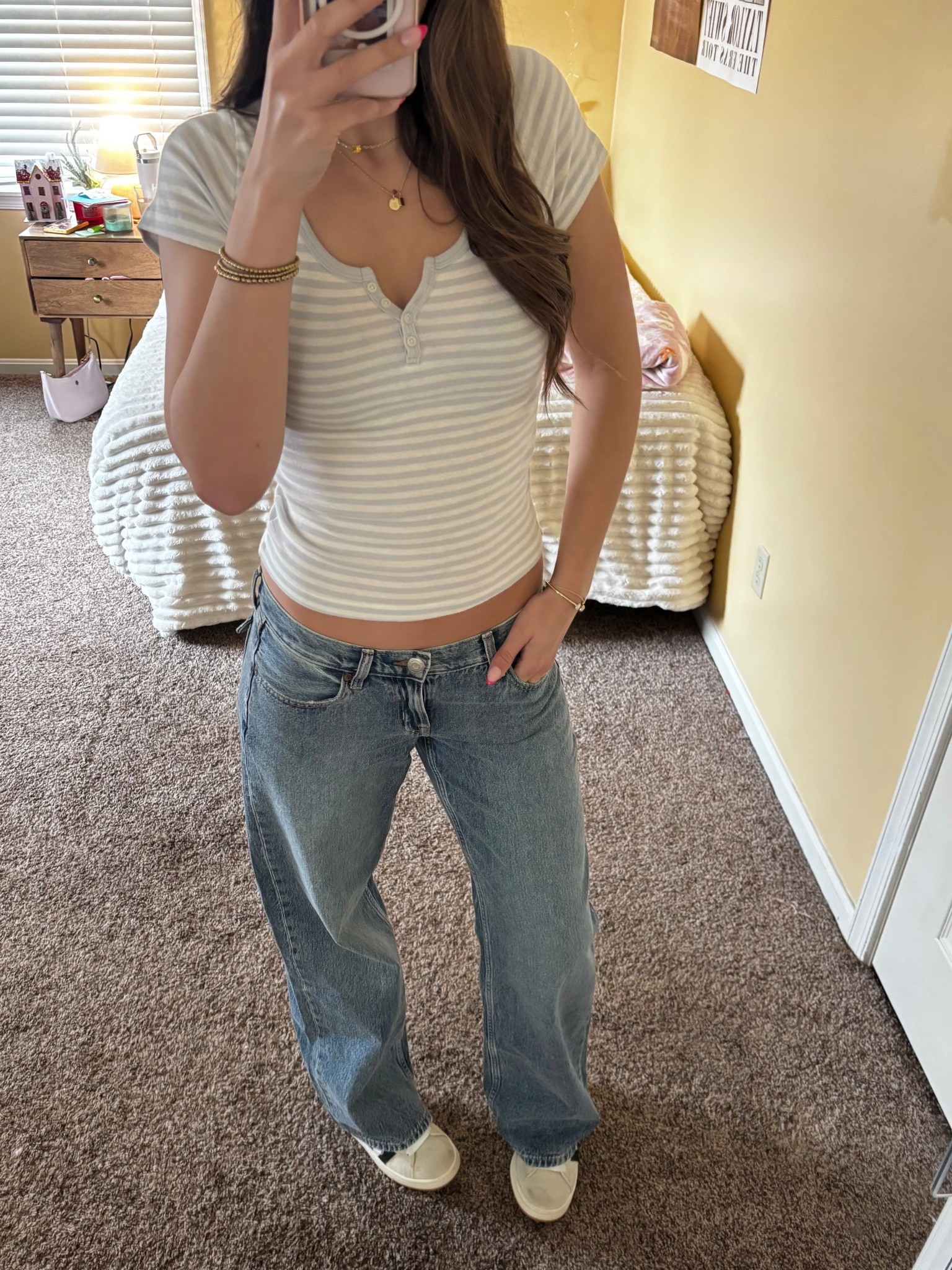 Striped top outfit idea with low rise jeans! 
#springoutfit2026

#LTKSeasonal #LTKootd #LTKSaleAlert