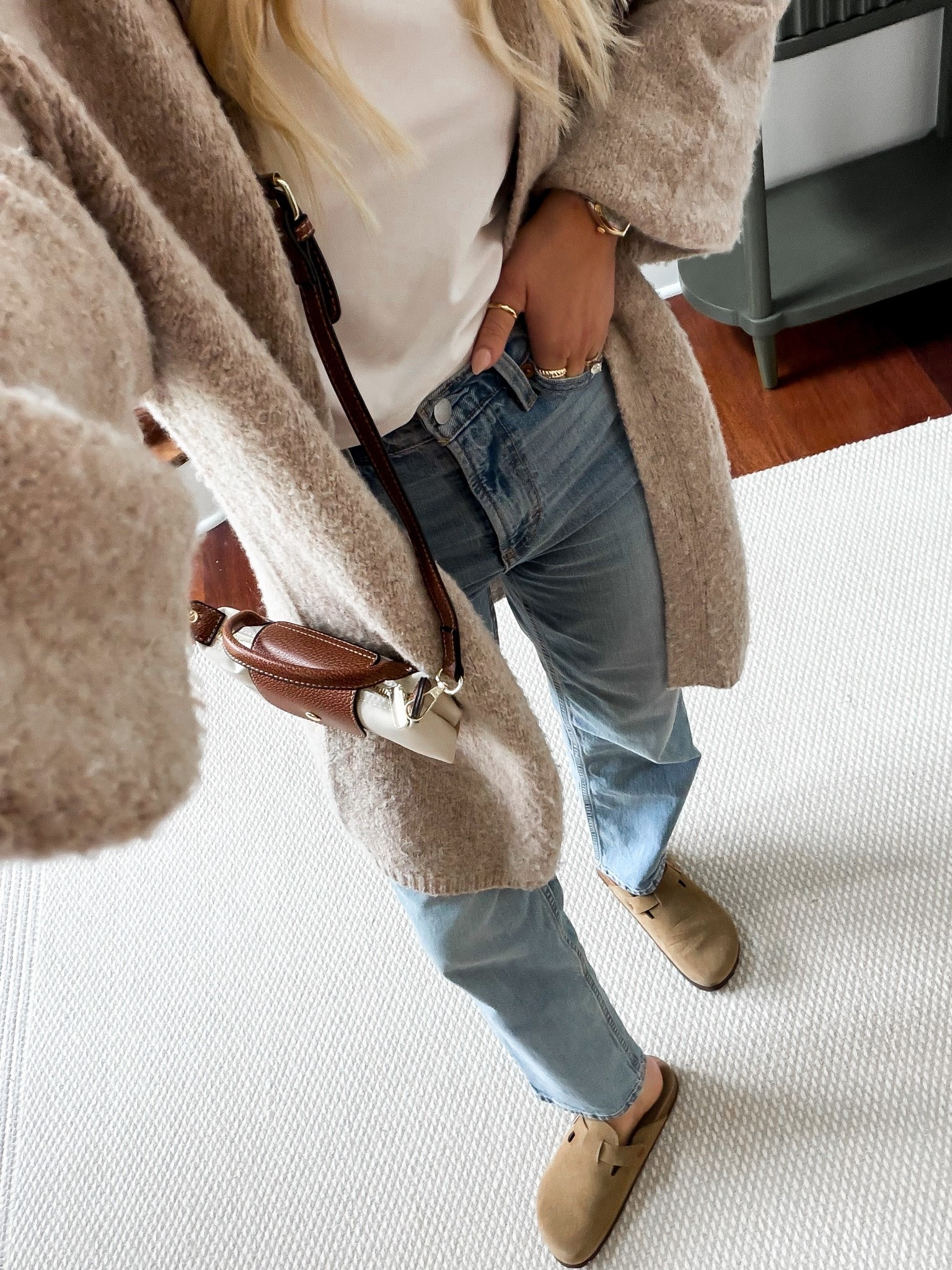 What I wore today to my son’s last day of school celebration! It’s unseasonably cold right now, but you can’t get wrong with the basics! Love this oversized cardigan- so crazy soft! This basic tee has been a staple for years now and they brought it back! And these viral straight leg Target jeans are a hot seller for a reason! Clogs and this little longchamp look for less on repeat!

#LTKootd #LTKdayinmylife #LTKgrwm