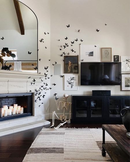 Still love my black butterfly Halloween decor from last year so much that it will be making a repeat appearance this year.  Do you have a favorite piece of Halloween decor you look forward to putting out each year?

P.S.  My fireplace candles are all frameless and come on automatically each night.  A nice trick and treat all at once 🕯️ 



#LTKSeasonal