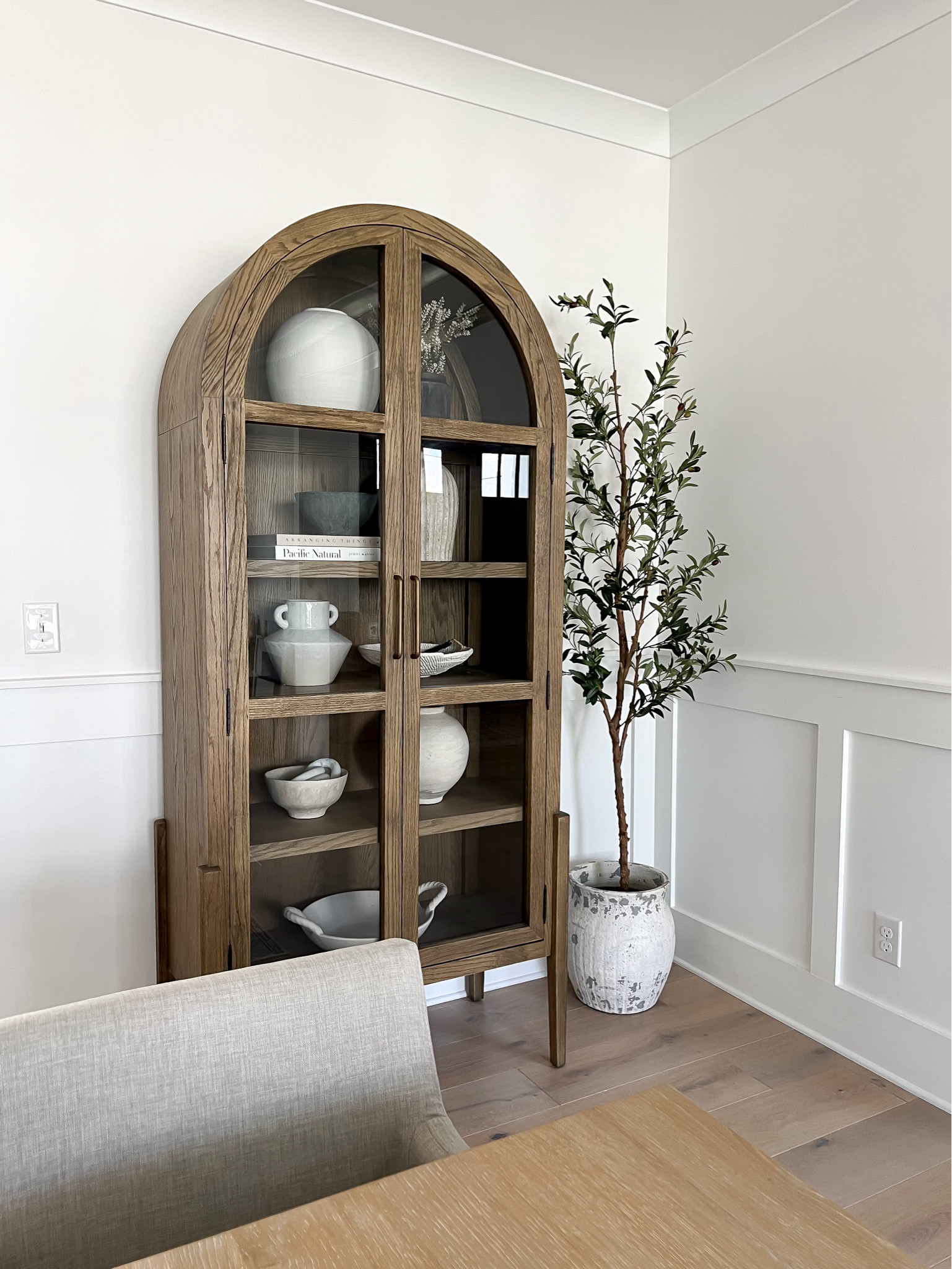 The arched cabinet of my dreams from @laylagrayce 

Arched cabinet, glass door cabinet, tall cabinet, oak cabinet, white oak cabinet, curio cabinet, display cabinet

#LTKHome #LTKStyleTip