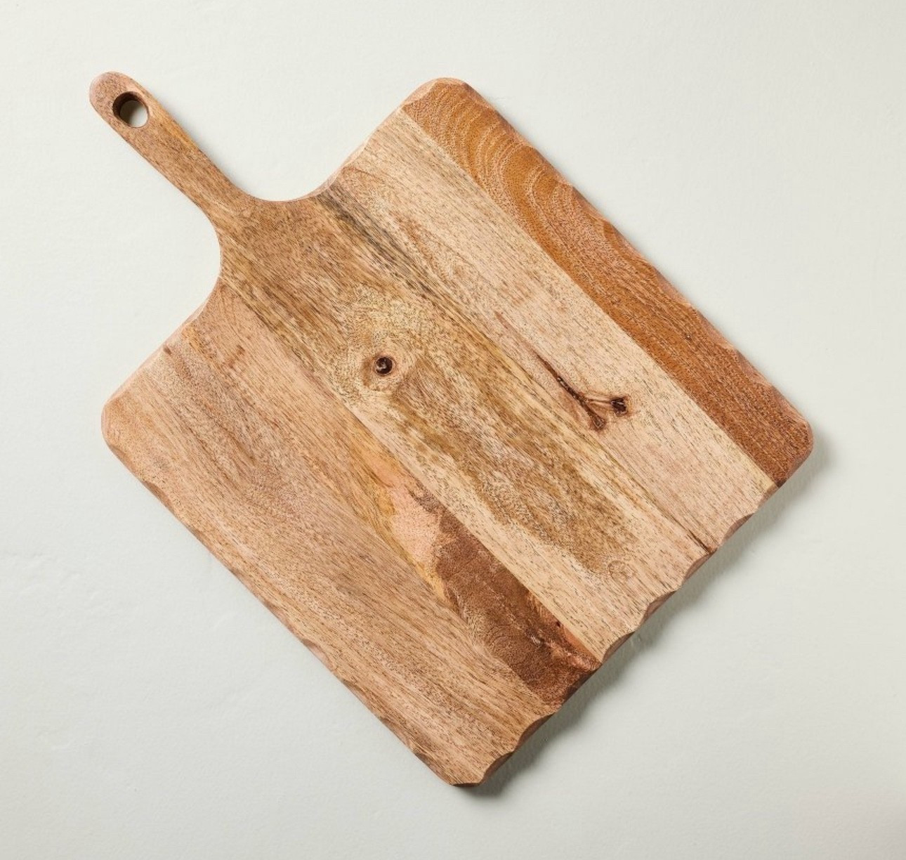 Carved Edge Square Wood Board
I was pleasantly surprised by this  board 
when I saw it in person! I love the edges and there’s a hole in it already for hanging!
$24.99

“Present your food in style with this Square Wood Board from Hearth & Hand™ with Magnolia. Made of wood, this rectangular board features carved edges in a scalloped design that ensure safe use and give a distinct look to your table. Additionally, it features a handle for easy portability and includes a hole for hanging from a peg, allowing for efficient storage. “

#LTKBump #LTKTall