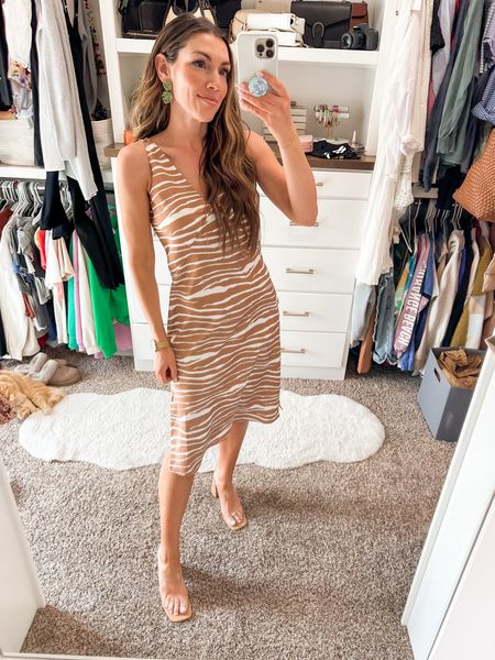 This satin slip dress is amazing on black or in a fun print! Throw on a blazer and head to work or dress it up for a wedding guest! #dresses

#LTKunder50 #LTKworkwear #LTKstyletip