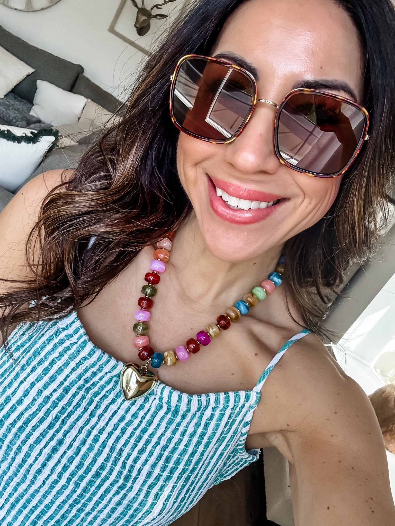 Sunglasses, heart necklace

#LTKOver40