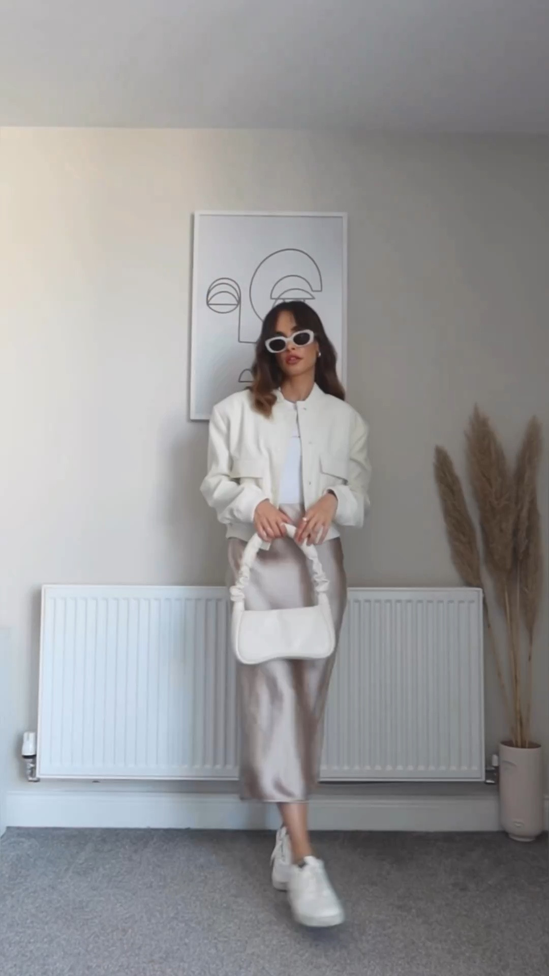 White bodysuit, satin silk skirt, cream jacket, white trainers, white black sunglasses, white shoulder bag

#LTKstyletip #LTKSeasonal #LTKeurope