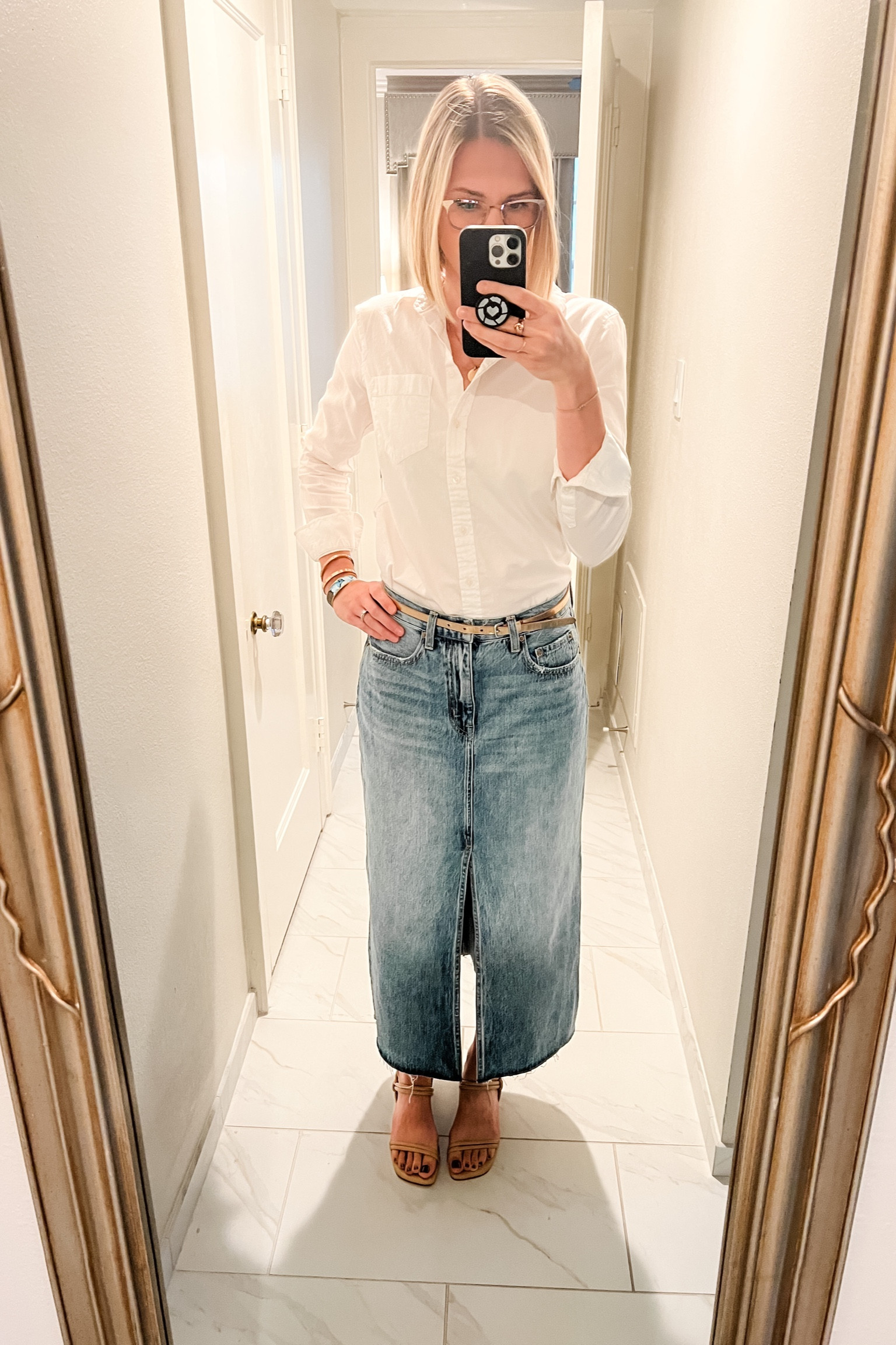 Traveling for work outfit! Paired a classic white button up with a midi jean skirt and nude sandals.

#LTKtravel #LTKSeasonal