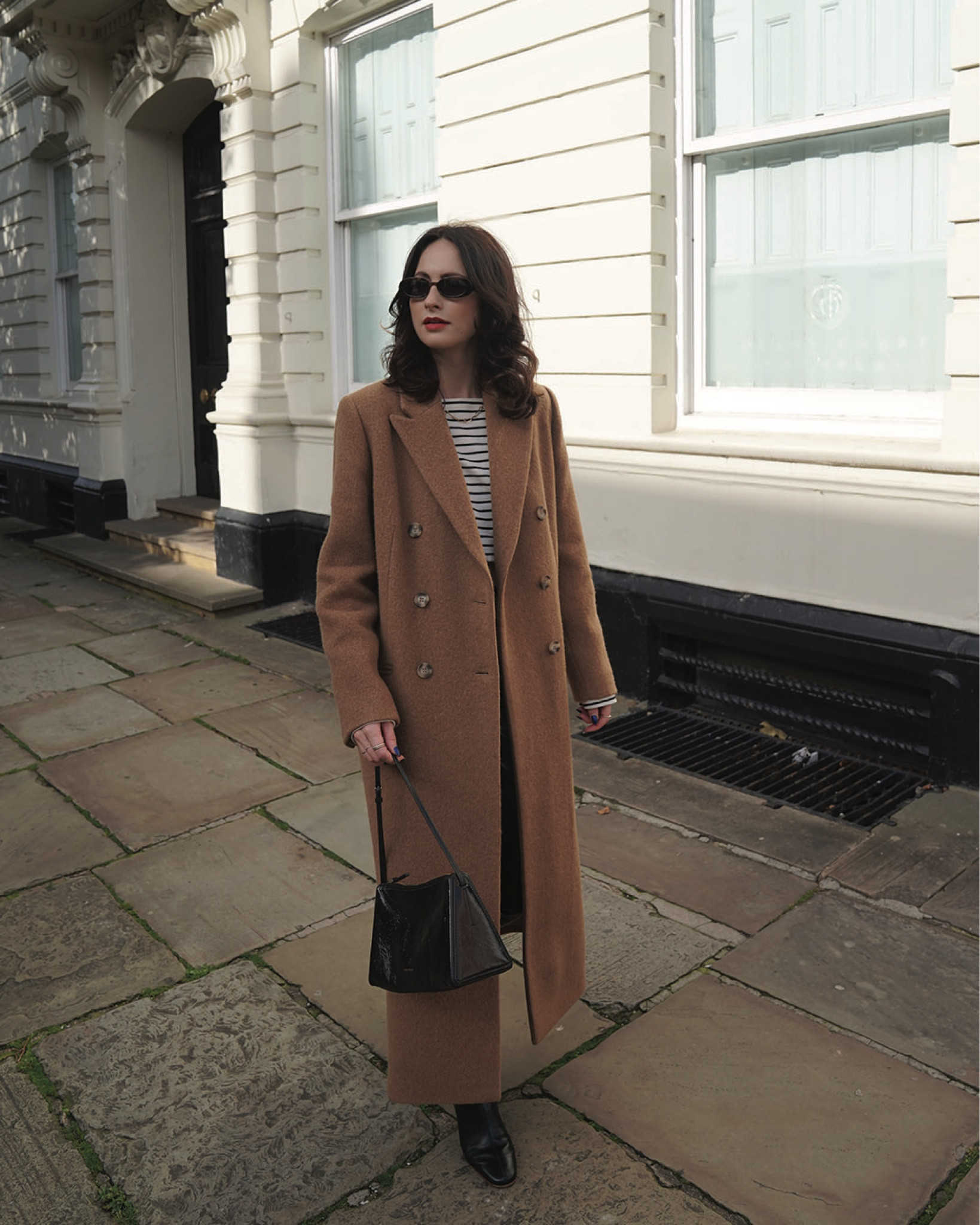 camel wool blend coat, striped top, leather pants, sunglasses, black bag, gold hoops, chain necklace, gold jewellery, heeled boots, whistles, frankie shop, le specs, net a porter, selfridges, by far, coggles, astrid & miyu, monica vinader, daisy jewellery, manu atelier, luisaviaroma, agolde, abercrombie and fitch, h&m, arket 

Black Friday/Cyber Week discounts:
wool blend coat: whistles 20% off 
wool blend coat: abercrombie & fitch 25% off
by far black boots: (via coggles) 25% off
gold hoops: astrid & miyu 25% off
gold bracelet: monica vinader 30% off 
chain necklace: daisy jewellery 20% off 



#LTKCyberSaleUK #LTKeurope #LTKstyletip