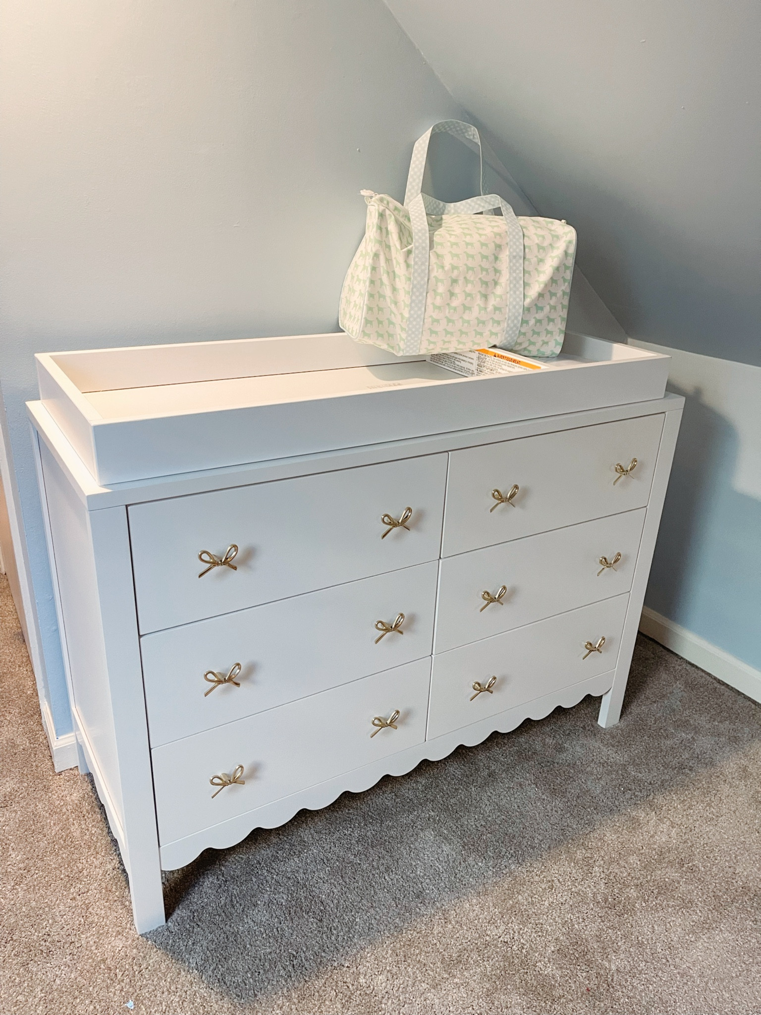 Nursery dresser. Scalloped dresser. Six drawers. Gold bow knobs. Baby dresser. Nursery inspo. 


#LTKHome #LTKFamily #LTKBaby