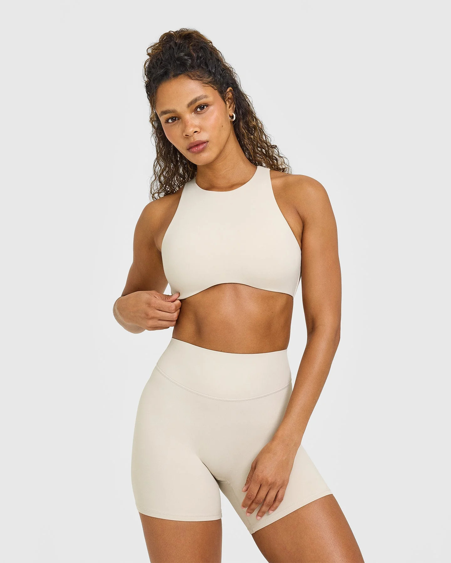 SoftMotion™ High Neck Sports Bra with White Logo 
 Sand | Oner Active (UK / US)