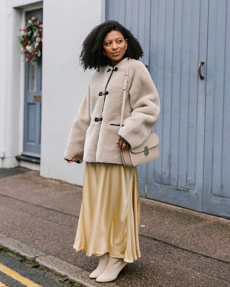 Faux fur coat and satin dress Winter outfit. 

Petite style 

#LTKover40 #LTKeurope #LTKstyletip