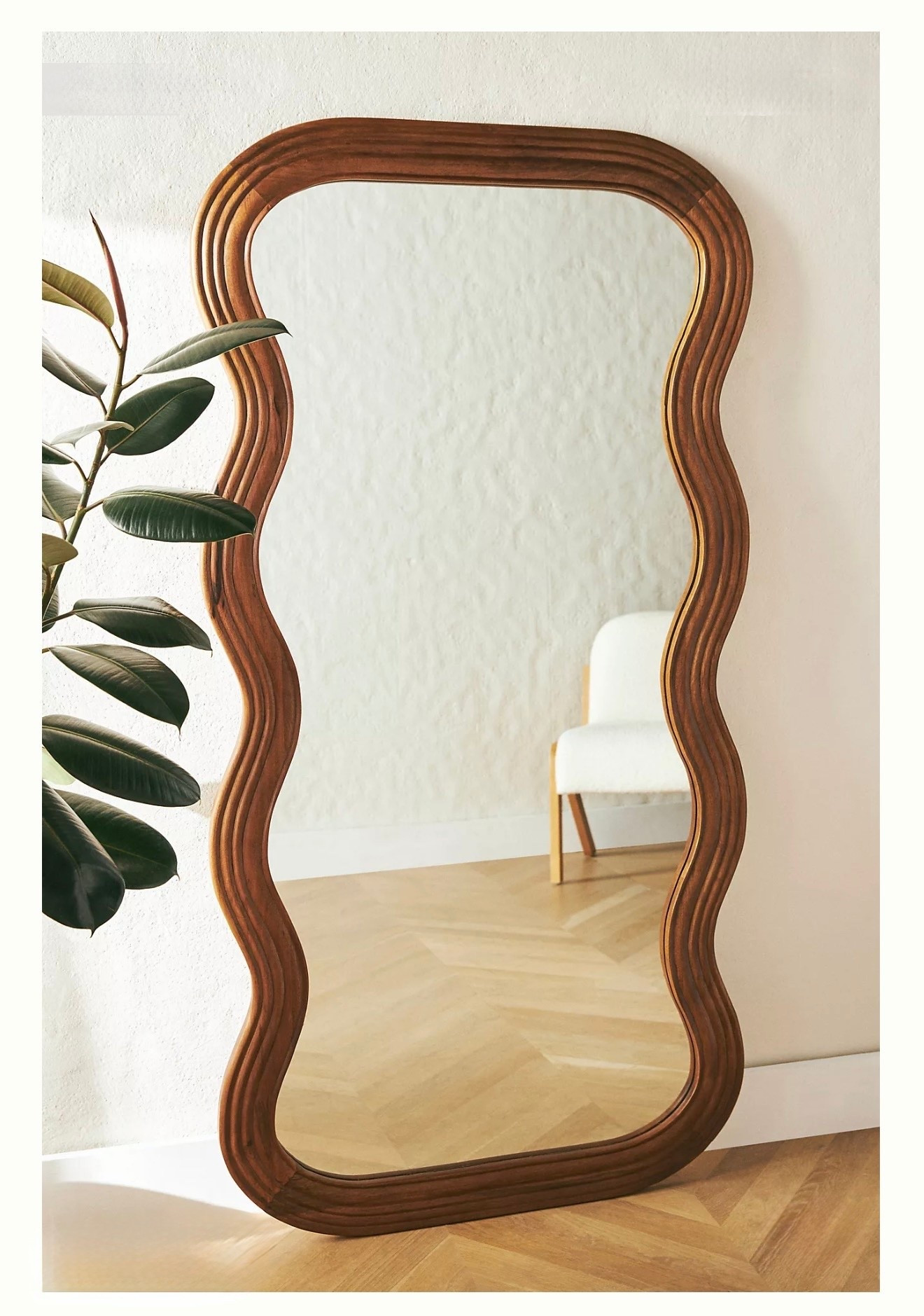 Frances Tropical Hardwood Mirror

Boasting a wavy wooden frame, this mirror offers a modern yet playful accent that will make a statement in any room of your home.

#LTKGiftGuide #LTKHoliday #LTKHome