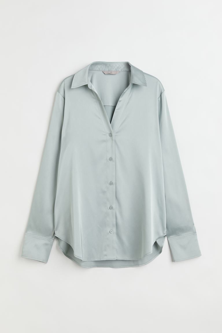 V-neck blouse in woven fabric with a sheen. Collar, buttons at front, and long sleeves with a sle... | H&M (US + CA)