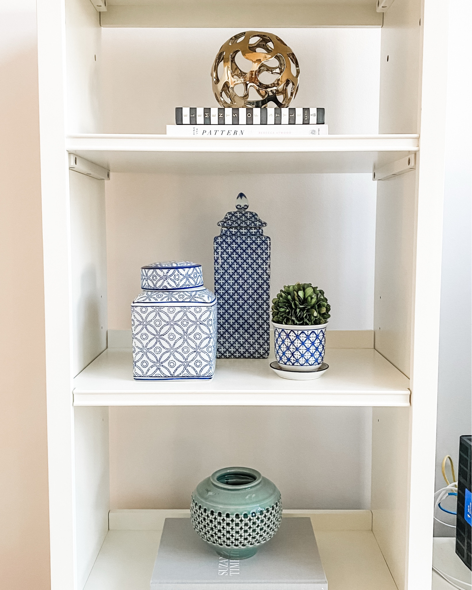 Create a harmonious and calming space by repeating patterns and themes throughout your home decor. Whether it's a color palette, a pattern like these blue and white ceramics, or a metallic accent, consistency ties the whole look together. This simple design approach brings balance and a sense of calm to any room. ✨ #HomeStyling #PatternPlay #CozySpaces

#LTKFindsUnder100 #LTKSaleAlert #LTKHome