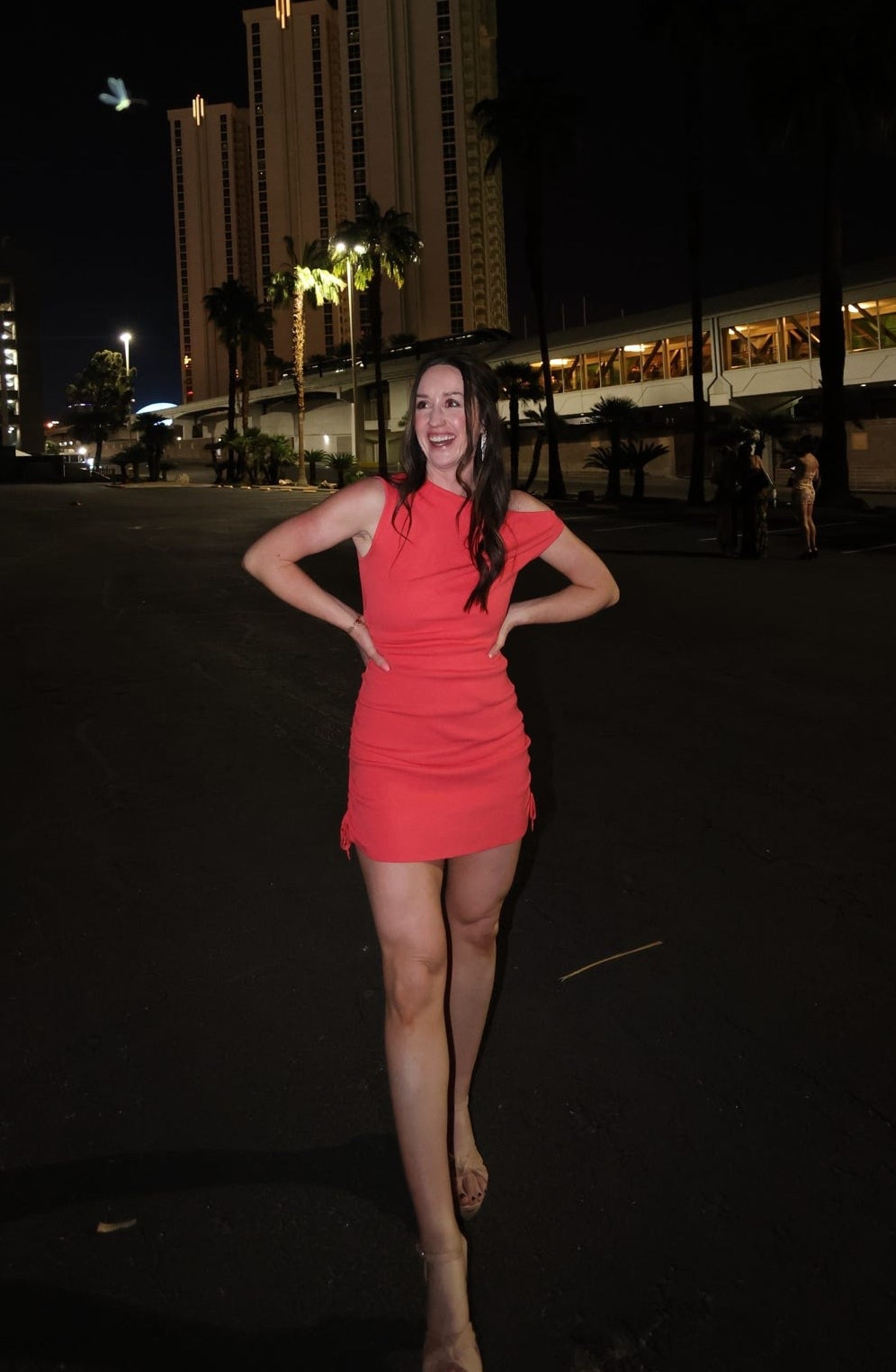 The cutest and comfiest dress! Soft cotton material, ruched, and the ties on the sides are adjustable. Wearing a small
