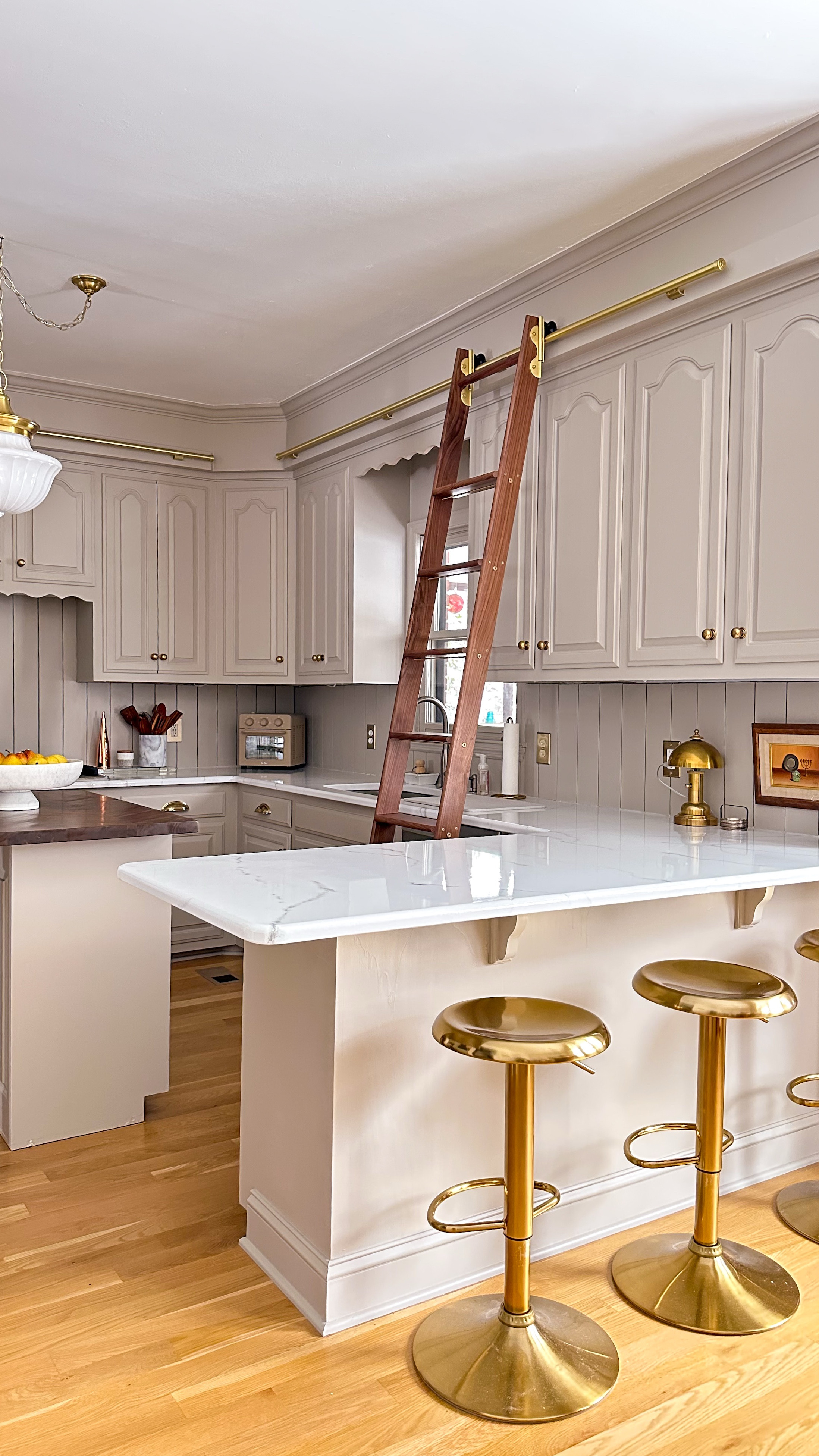 One of my most commonly asked questions is what color are your kitchen cabinets?

This is Stone Hearth by Benjamin Moore. Creamy, warm and a little bit of a mood. I think this. Ominous lair well with almost any countertop color!

If you’re new here hi and welcome! I flipped this kitchen by myself last year and am so proud of how it turned out. Proof that you can put new love into old spaces and make them your own 🫶🏼 Hope you’ll stick around…plenty more spaces to flip in this house!

See something you like? Comment SHOP and I’ll send you sources straight to your inbox 💌

#DIY #homeimprovement #kitchenrenovation #kitchenremodel #budgetfriendly #diycountertops #kitchentransformation #kitchendesign #diyprojects #marble #fauxmarble #countertops #transformation #beforeandafter #home #lovewhereyoulive 

Moody | Cozy | Cozy Interiors | Moody Aesthetic | Secondhand | vintage | home improvement | renovation | traditional | interior design | design inspo | home decor | antiques | thrifted finds | collected home | thrifting | affordable decor | DIY | facebook marketplace  | FBMP | estate sales | sustainable | upcycle | Nashville