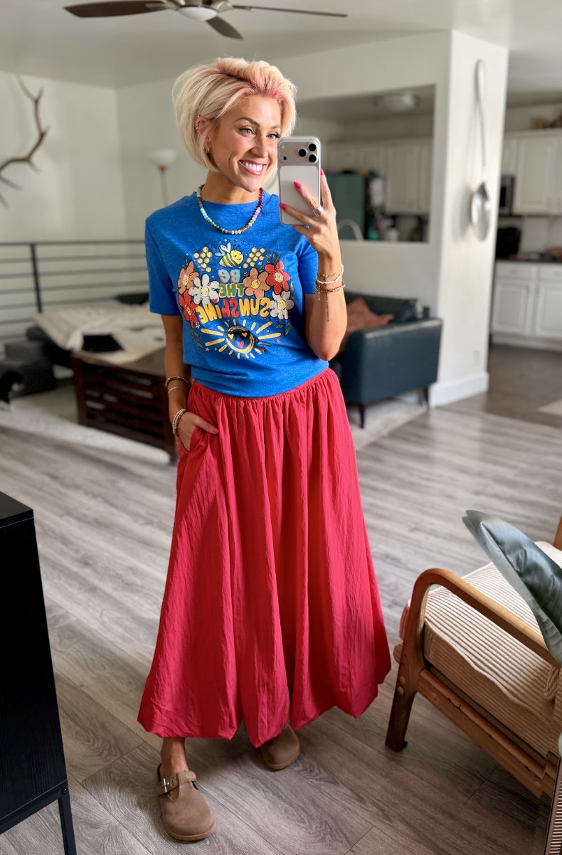 Feeling cute in this fun graphic tee! Top: Small // Skirt: Medium // Clogs: TTS 

 #LTKootd #LTKSaleAlert