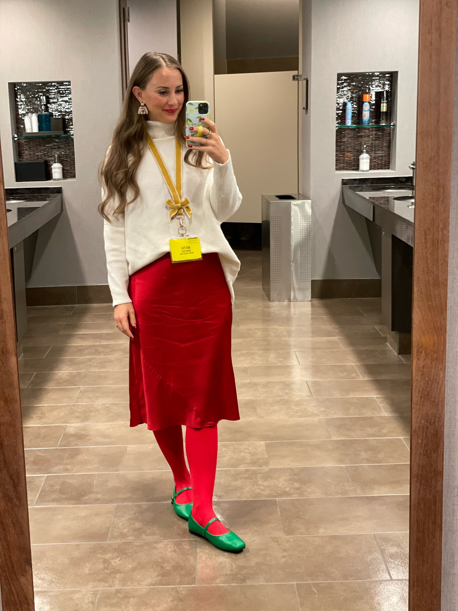 This is a Quince silk dress that I have my sweater over and tucked using an elastic belt.  Are we still front tucking?  Because I can’t stop won’t stop. 🤷🏼‍♀️

Tights and shoes are from Amazon.  And my earrings are old, but I linked some current Christmas earrings!

#LTKHoliday #LTKSeasonal #LTKWorkwear
