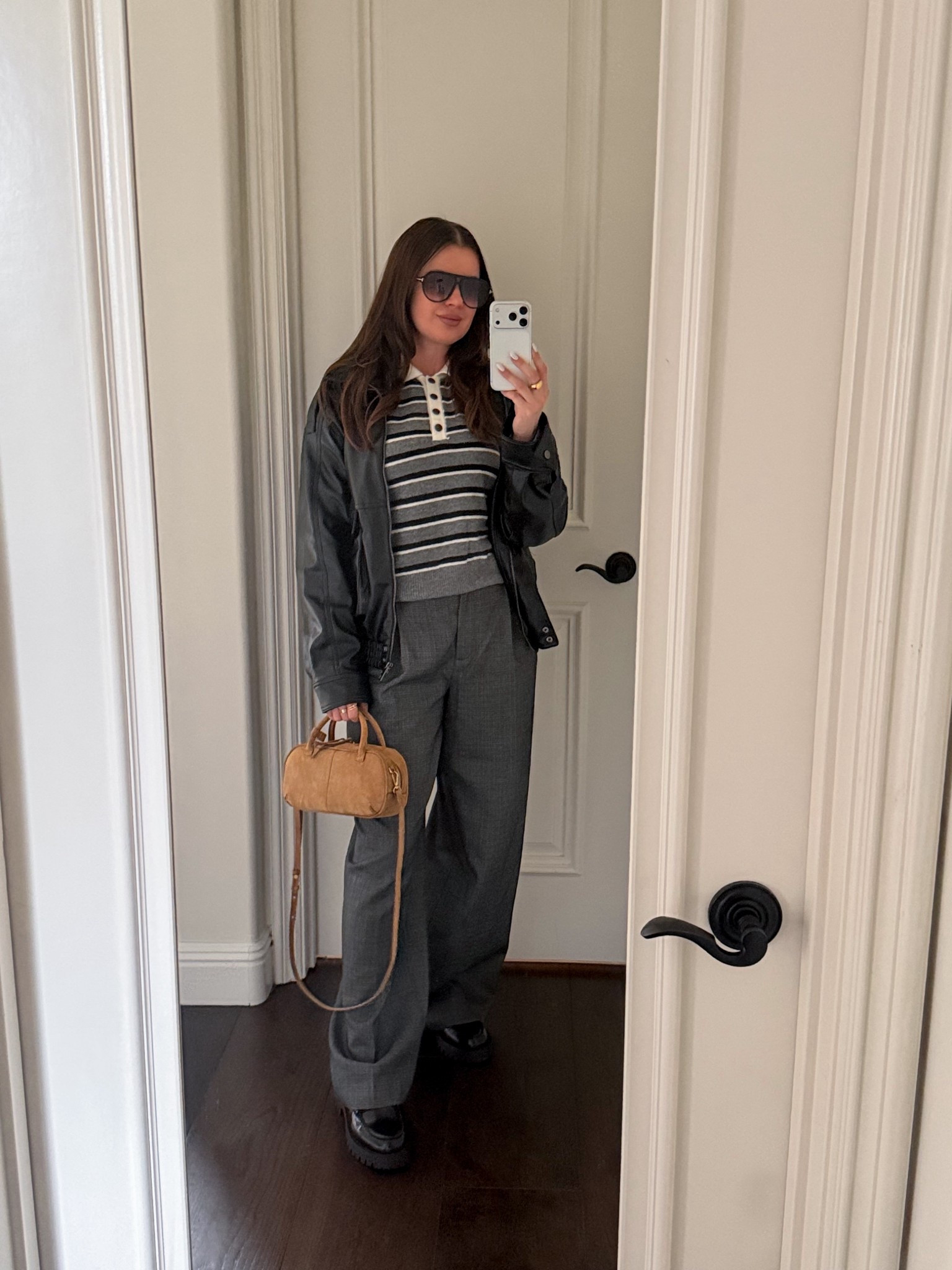 Styling a striped rugby sweater with wide leg pants, a leather bomber jacket, loafers and a suede mini bag 
#bomber #jacket #falloutfit #rugby #polo #striped #sweater #widelegpants #leather #suede #bag #purse 

#LTKFindsUnder100 #LTKootd #LTKFindsUnder50