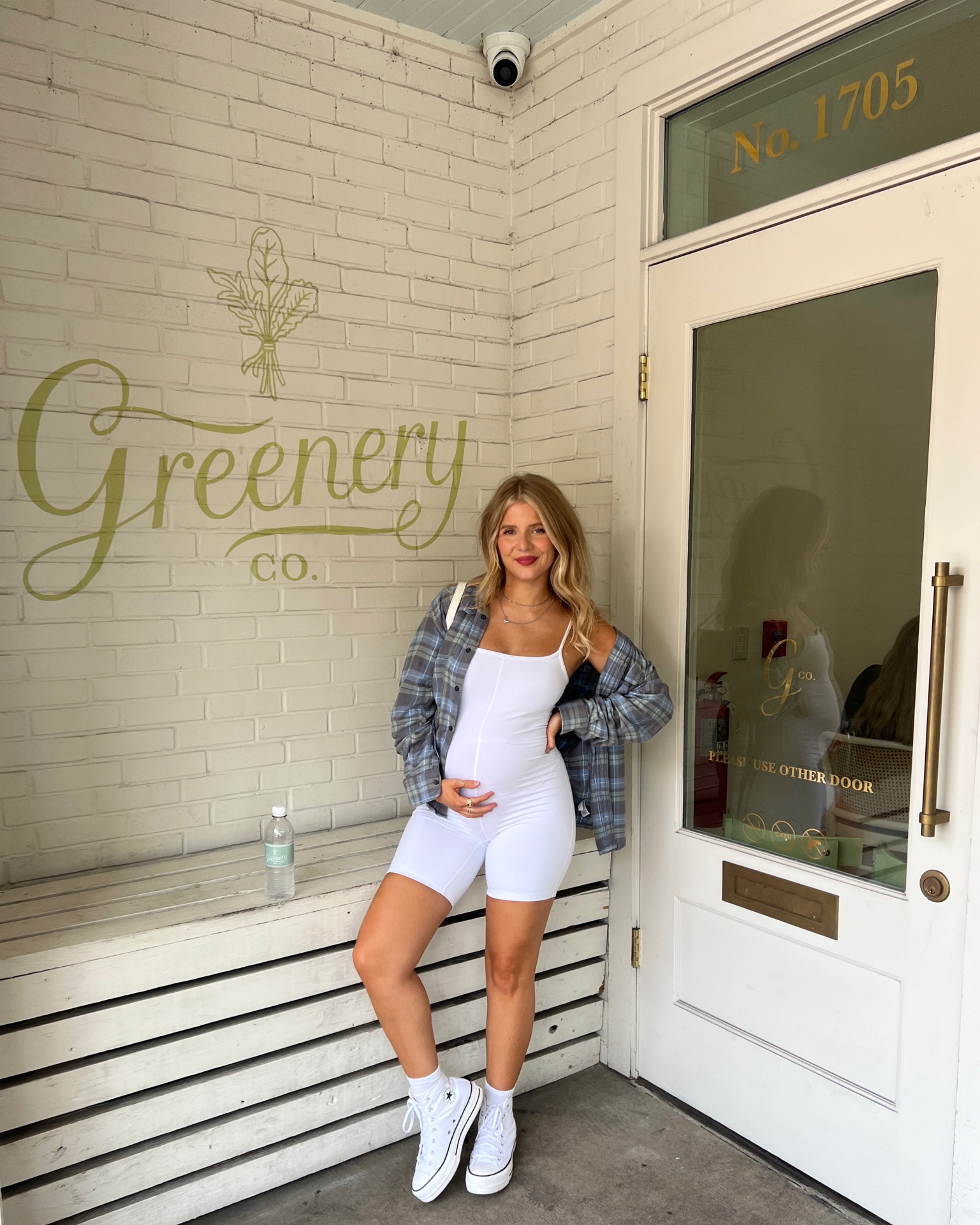 22 weeks pregnant outfit: white romper, flannel, and white platform converse 

#LTKbump #LTKunder50