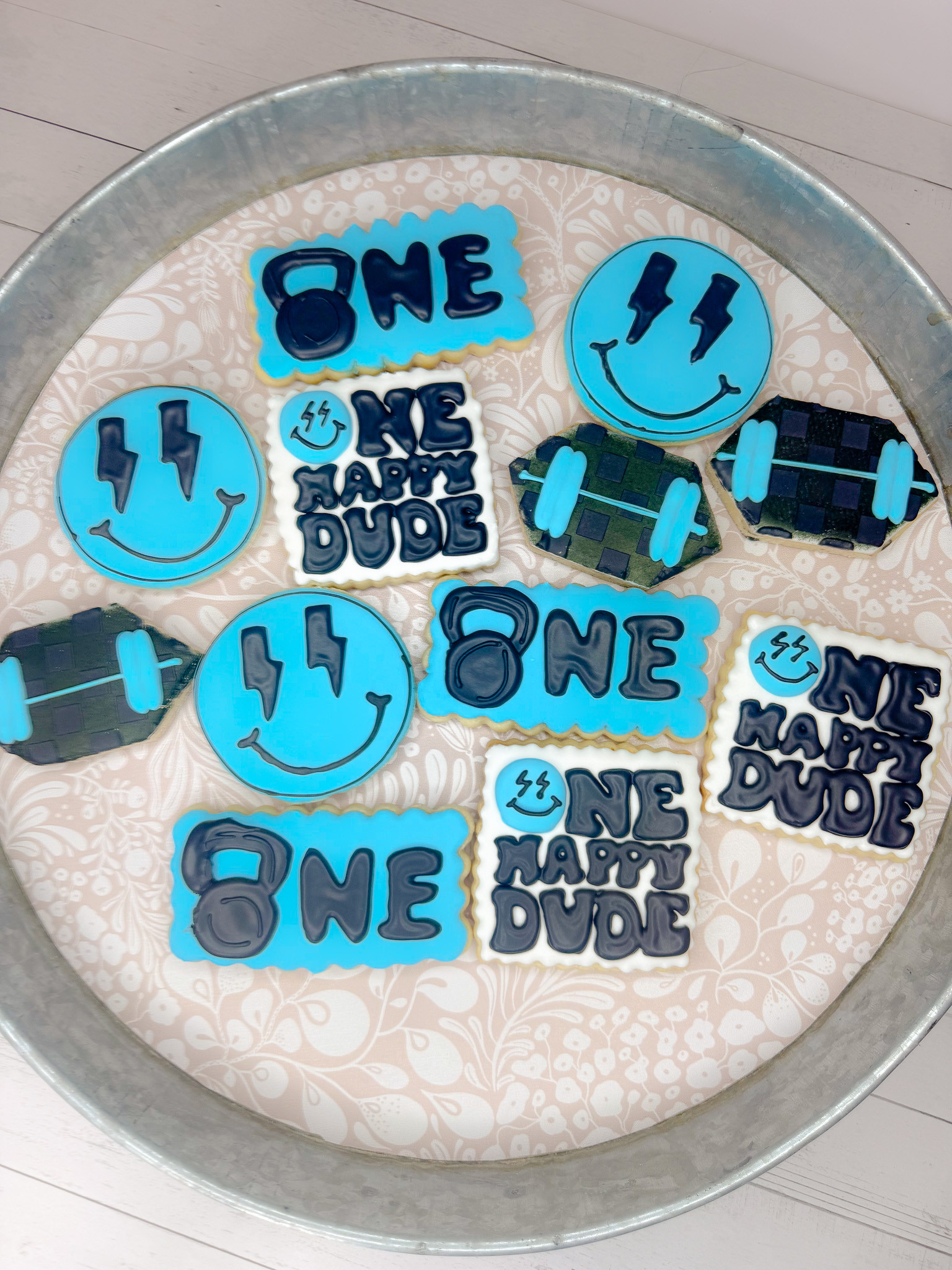 This “One Happy Dude” cookie set was such a fun one to make! 💙 The bright blue, bold black lettering, smiley faces, lightning bolts, and checkered details make it such a cute theme for a boy’s first birthday. Perfect for a dessert table, party favor, or custom birthday treat that matches the whole celebration.

#LTKFamily #LTKKids #BirthdayCookies #FirstBirthday #BoyBirthdayParty #OneHappyDude #CustomCookies #DecoratedCookies #SugarCookies #CookieDecorating #BirthdayPartyIdeas #DessertTable #PartyInspo #KidsBirthdayParty #BoyMomLife 

 #LTKdayinmylife #LTKfoodie #LTKKids