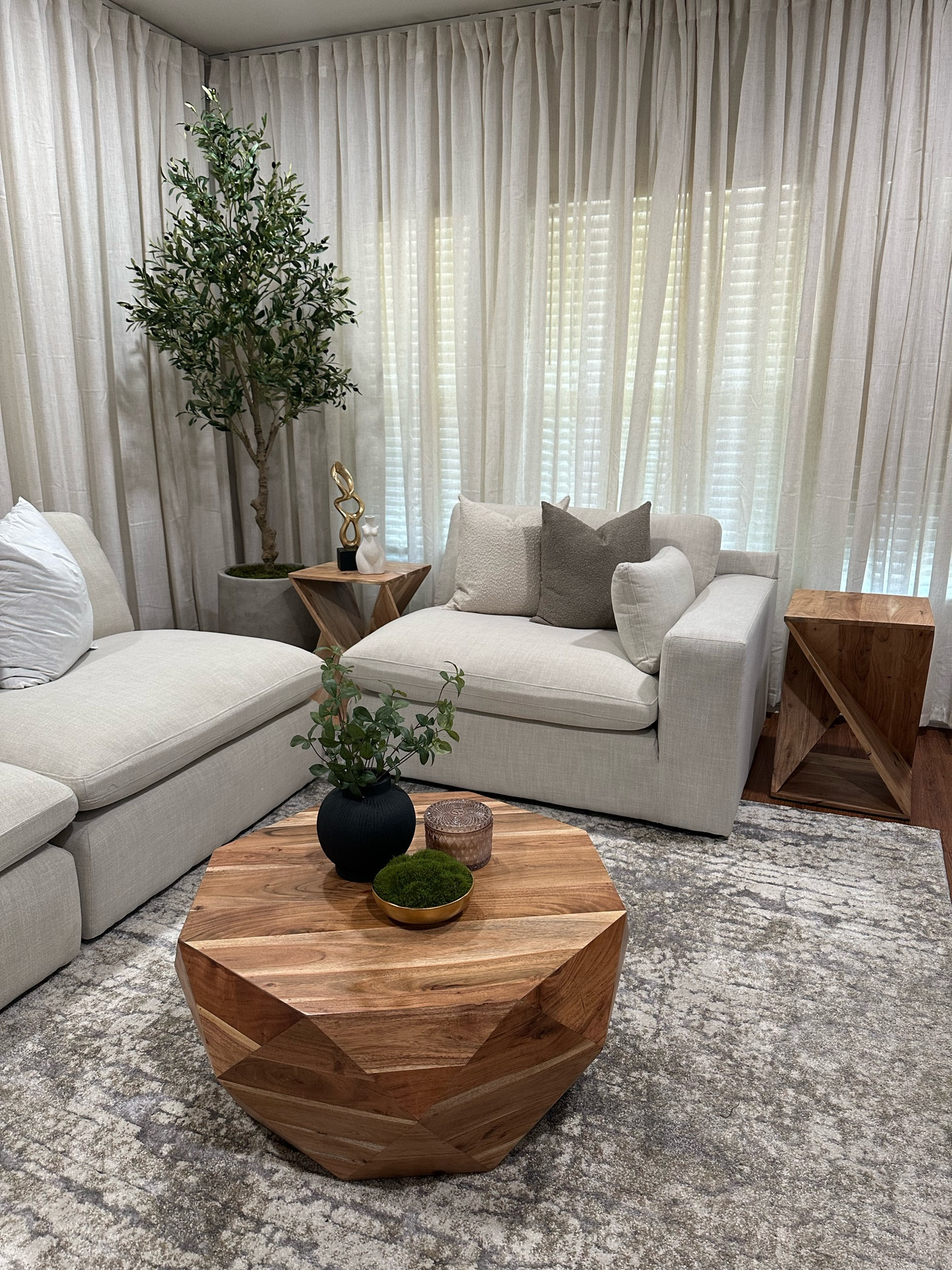 Beautiful solid wood end tables and coffee table warms up the neutral living room 

#LTKHome #LTKStyleTip #LTKxWayfair