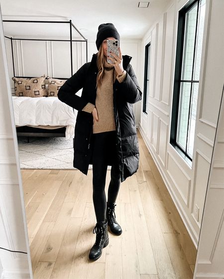 Fashion Jackson wearing black puffer coat, faux leather leggings, combat boots, anine bing camel sweater, turtleneck sweater, winter outfit, cold weather outfit 

#LTKstyletip #LTKtravel #LTKSeasonal