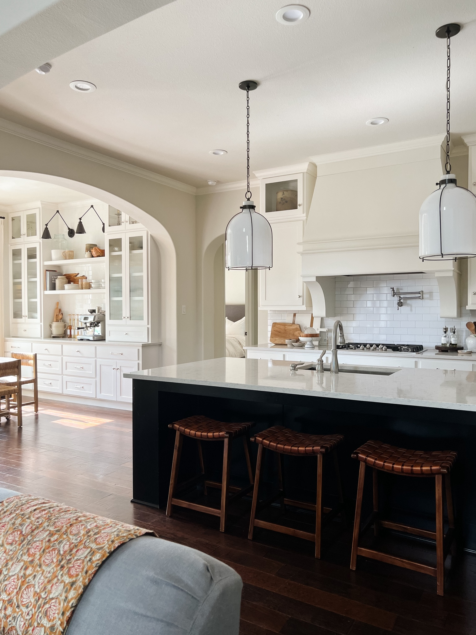 Warm up a black and white kitchen with wood and woven leather counter stools.  They come in multiple colors and both bar and counter height.



#LTKHome