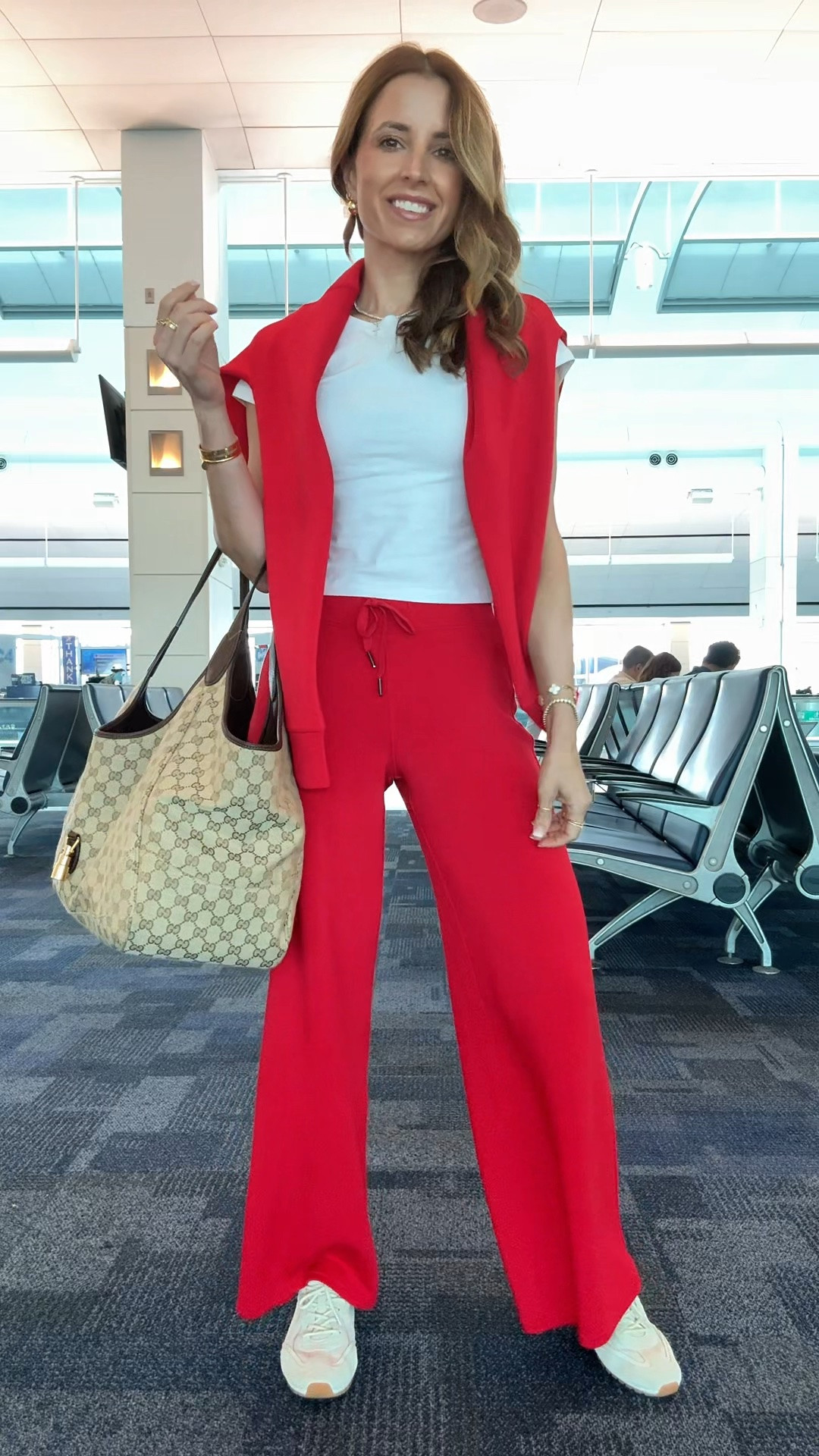 My airport travel outfit of the day! Airport outfit. Spanx matching set in XS petite (pants) and XS in top. Code LISAMARIEXSPANX on first time purchases. Abercrombie baby tee in XS. Tory Burch Field Sneakers feel like walking on a cloud - I went up half a size. Gucci Mercato tote in large.

#LTKootd #LTKPetite #LTKTravel