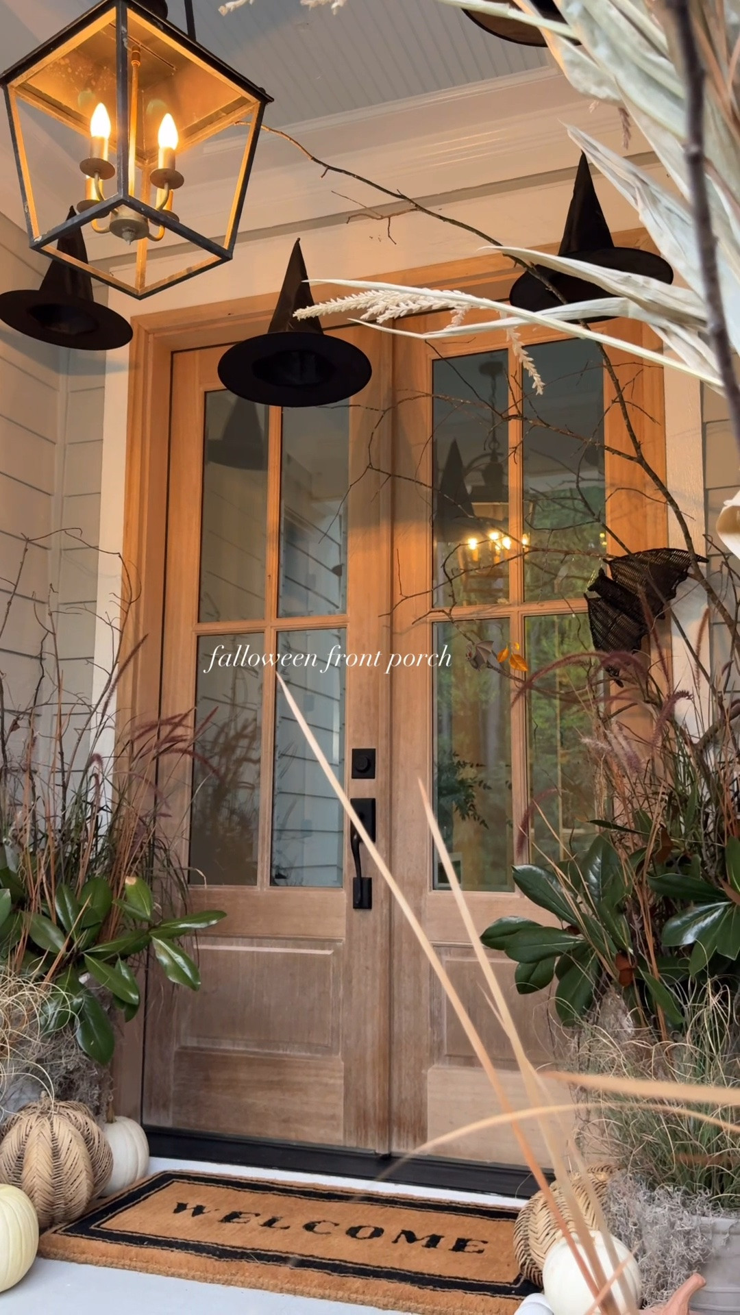 & the falloween porch is all done 🦇🍂 | completely obsessed with the magnolia clippings + branches, the witch hats & mix of neutral pumpkins 🤍 #falldecor #frontporch #halloweeninspo 

#fallfrontporch #fallplanters

#LTKSeasonal #LTKHome