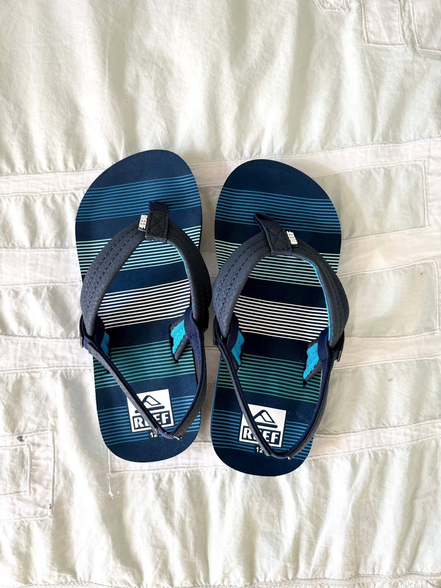 Toddler boys sandals that are actually comfortable! I got so sick of buying cheaply made Carter’s sandals that didn’t had any support and didn’t hold up. So, I went with Reefs for both my 4 and 7 year one boys and they said that they are super comfortable, which is a huge win! They both needed some Spring and Summer sandals and I ordered so many to try - these were the winners by a landslide! They’re super cute and navy so they’ll go with lots of outfits and Reefs are so well made that I know they’ll hold up as long as possible! at $25, they’re a little steep for me for kids shoes, but all of my Reefs have held up, so instaxd of buying another pair of crappy sandals halfway through the Summer, this is the way to go! They come in so many different colors and I’ve also linked a cute, more affordable open. 

Toddler boy shoes 
Big boy shoes
Little kid shoes

#LTKmomlife #LTKBaby #LTKKids