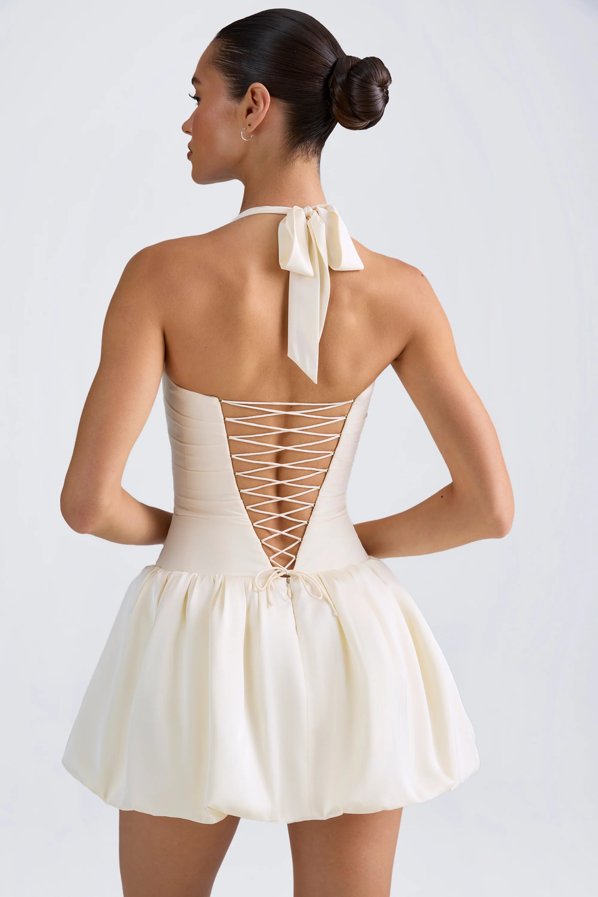 Halterneck Lace-Up Bubble Hem Corset Micro Mini Dress in Ivory | Oh Polly