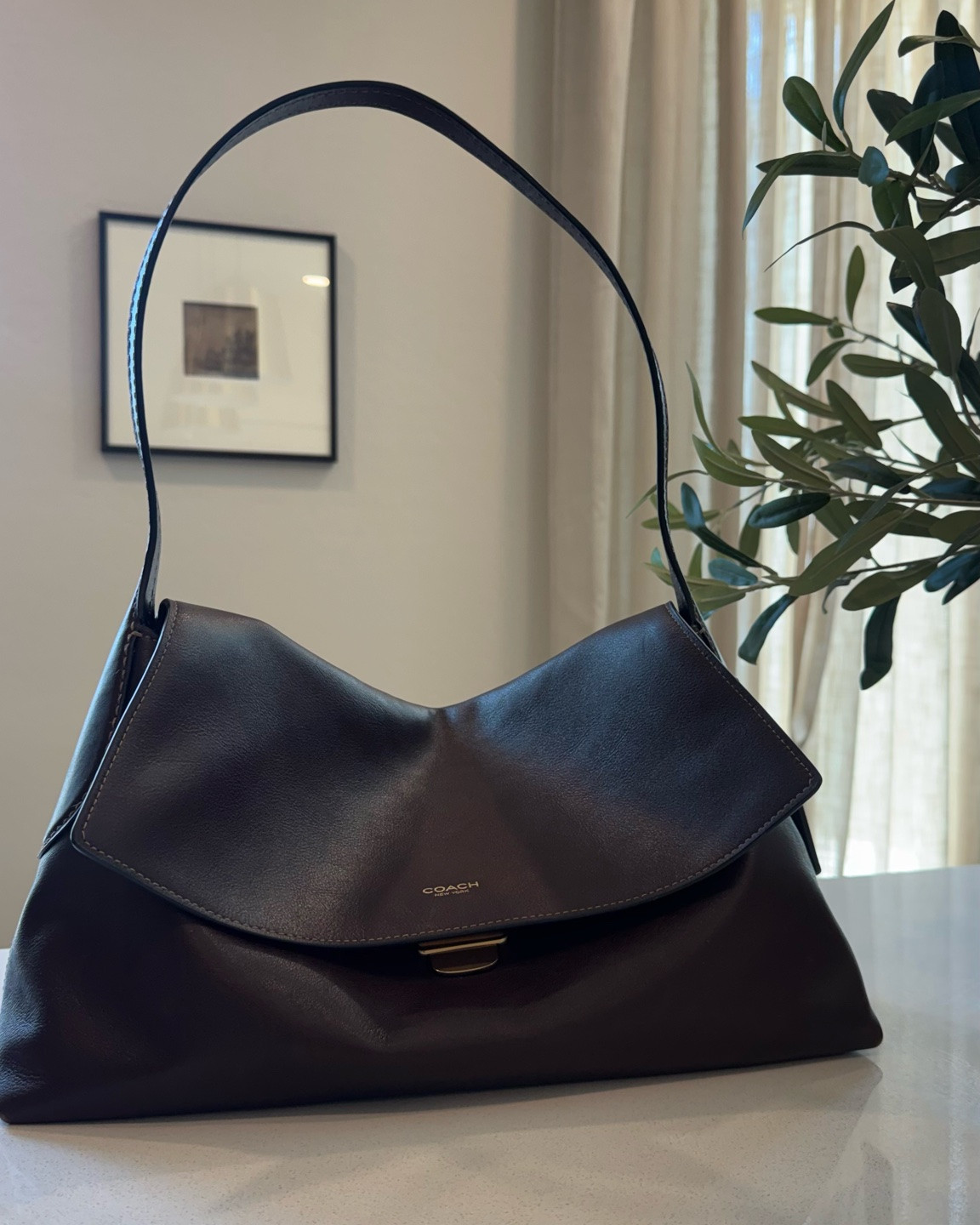 the “Chelsea” bag is easily my favorite everyday purse. so chic & minimal, and it doesn’t look it but it stores a lot! Perfect being a boy mom.

#LTKootd #LTKgrwm #LTKdayinmylife