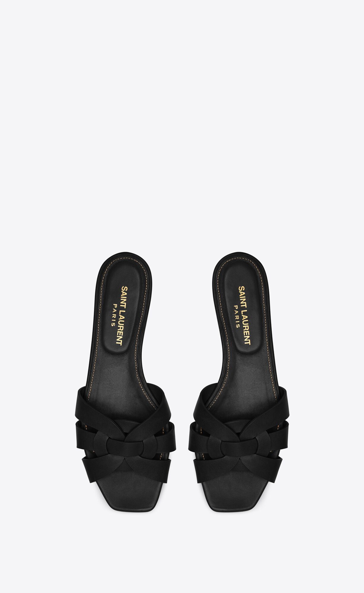 slip-on sandals made with metal-free tanned leather, featuring a square toe and intertwining stra... | Saint Laurent Inc. (Global)