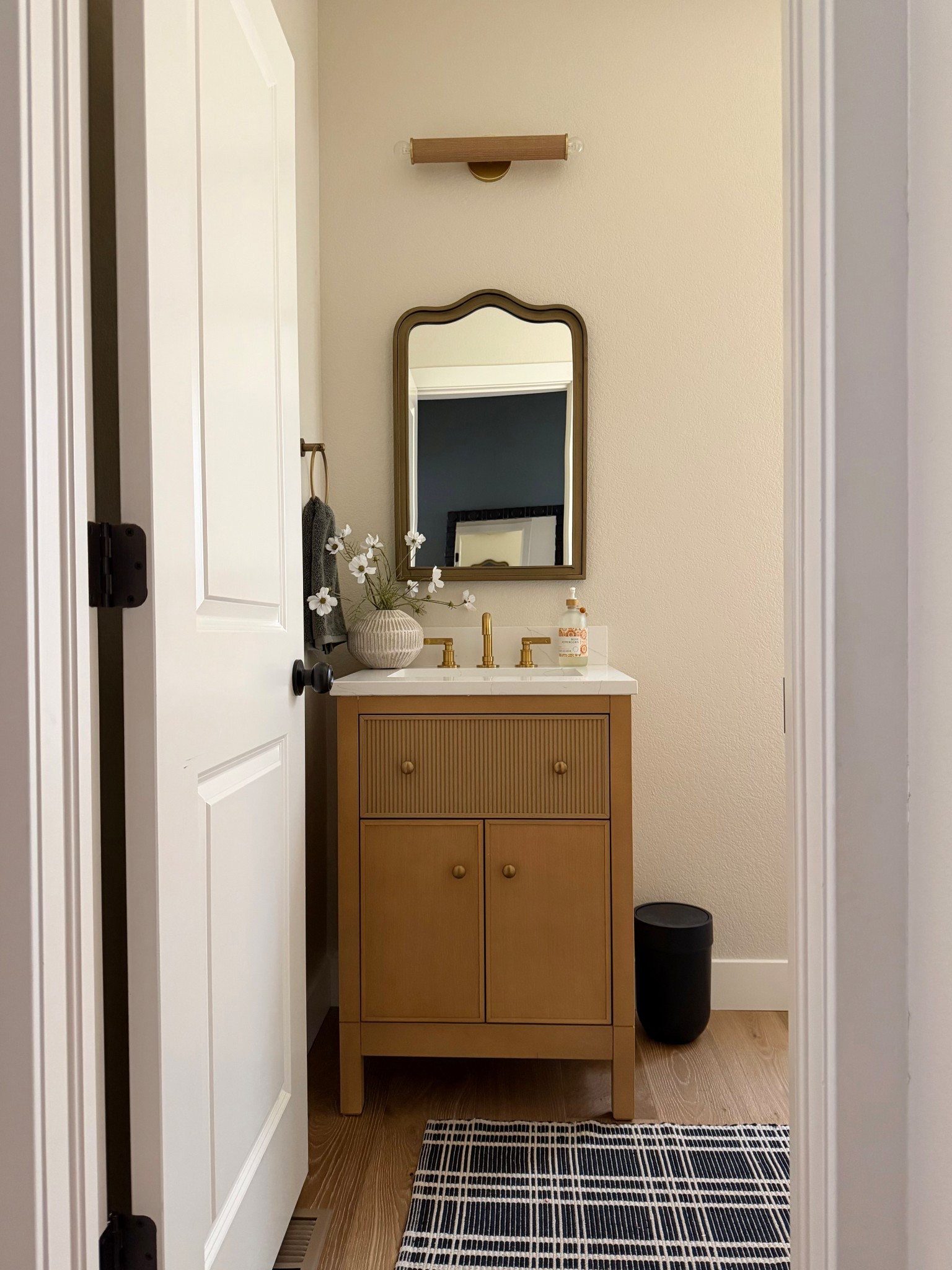 Small space, big impact ✨

Proof that even the tiniest powder bath can feel calm, curated, and elevated. From the warm wood tones to the soft brass accents… it’s all about layering simple details that make everyday moments feel a little more special 🤍

If you’ve been overlooking your powder room—this is your sign to give it a glow-up.



Save this for your next refresh + follow along for more livable, elevated spaces ✨

#powderroomdesign #bathroominspo #moderntraditional #neutralhome #calmhome #interiordesignideas #homedecor #brassfixtures #smallspacedesign #homeinspo #designinspiration #ltkhome #cozyminimal #currentdesignsituation #interiorstyling #simpleelegance