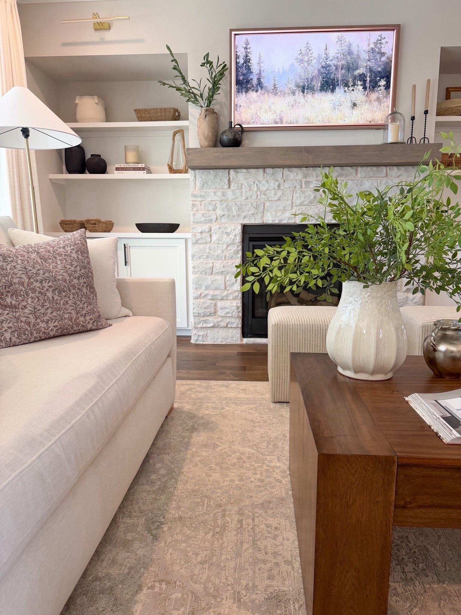 Living room, frame tv, fireplace inspo, fireplaces styling, mantle styling, fireplace stone, living room design, modern Classic home, neutral sofa, modern sofa, modern coffee table, wood coffee table 

#LTKhome