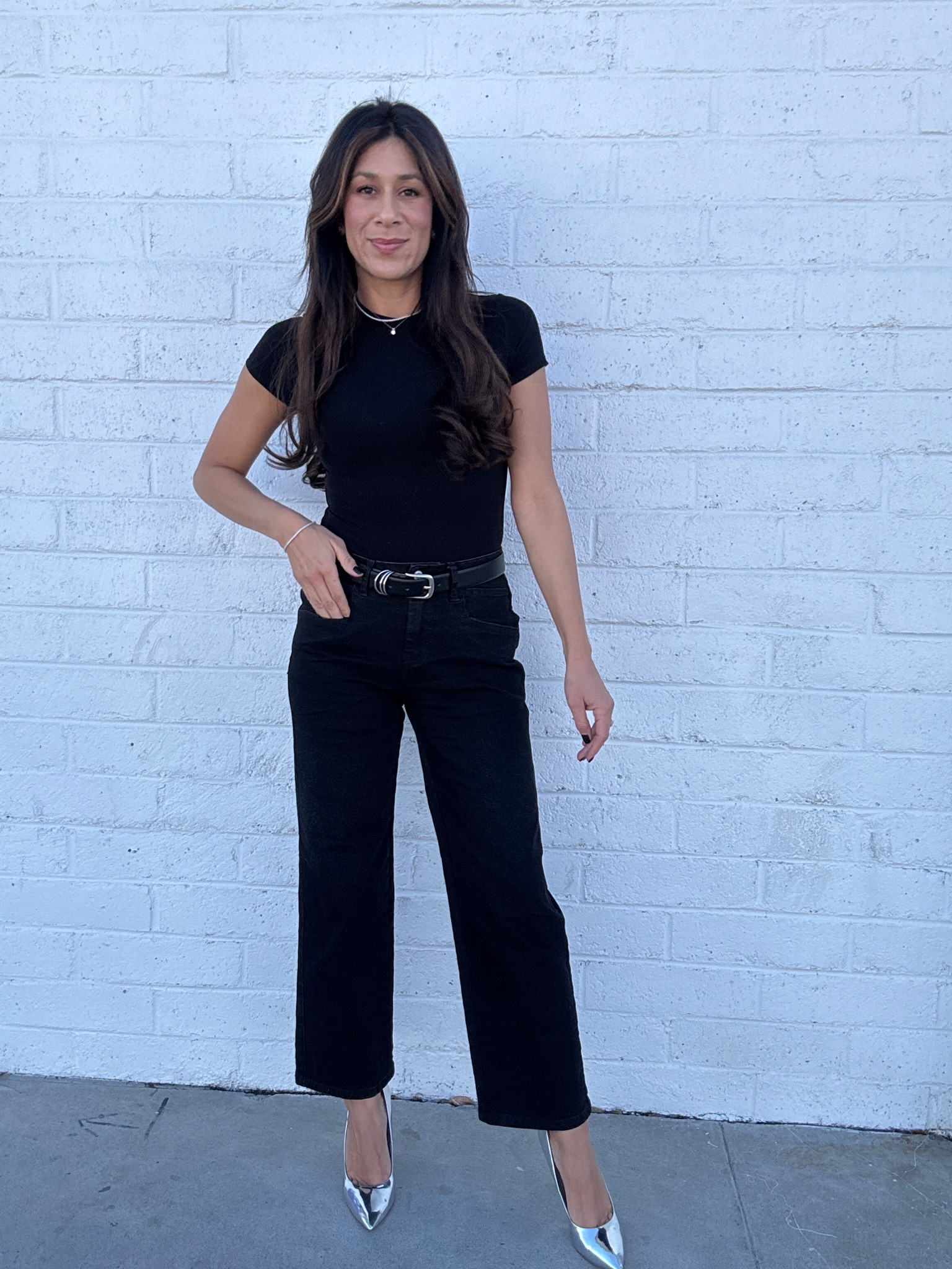 All black, but make it chic! 🖤 Keeping it sleek with a classic black tee, high-waisted denim, and a pop of metallic for that extra sparkle. ✨ #EffortlessStyle #ChicAndTimeless 

#LTKShoeCrush #LTKStyleTip #LTKFindsUnder50