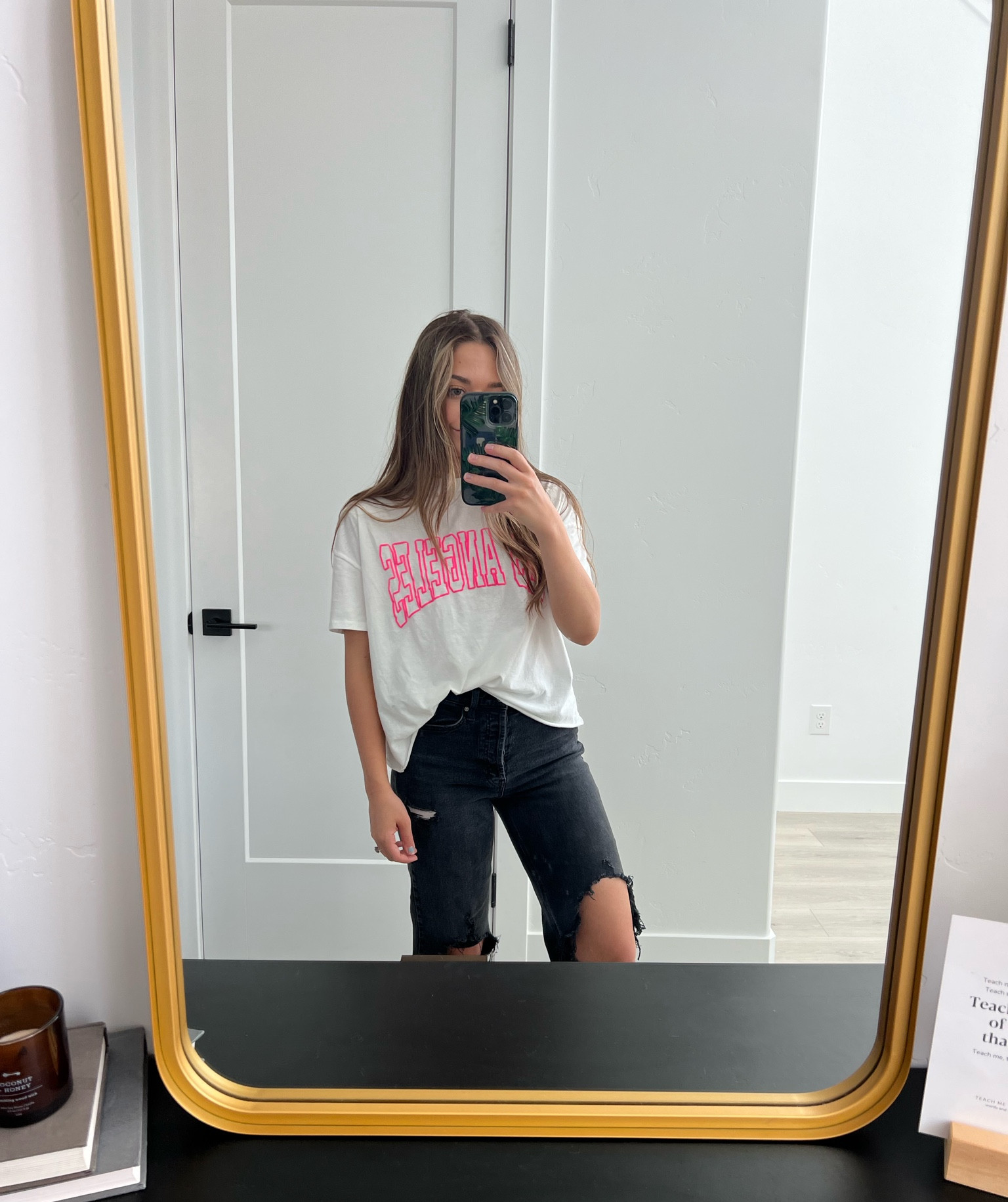 Love this $18 tee! I did take scissors to it and cropped it to my waist! Wearing a medium!

#LTKfamily #LTKhome #LTKstyletip