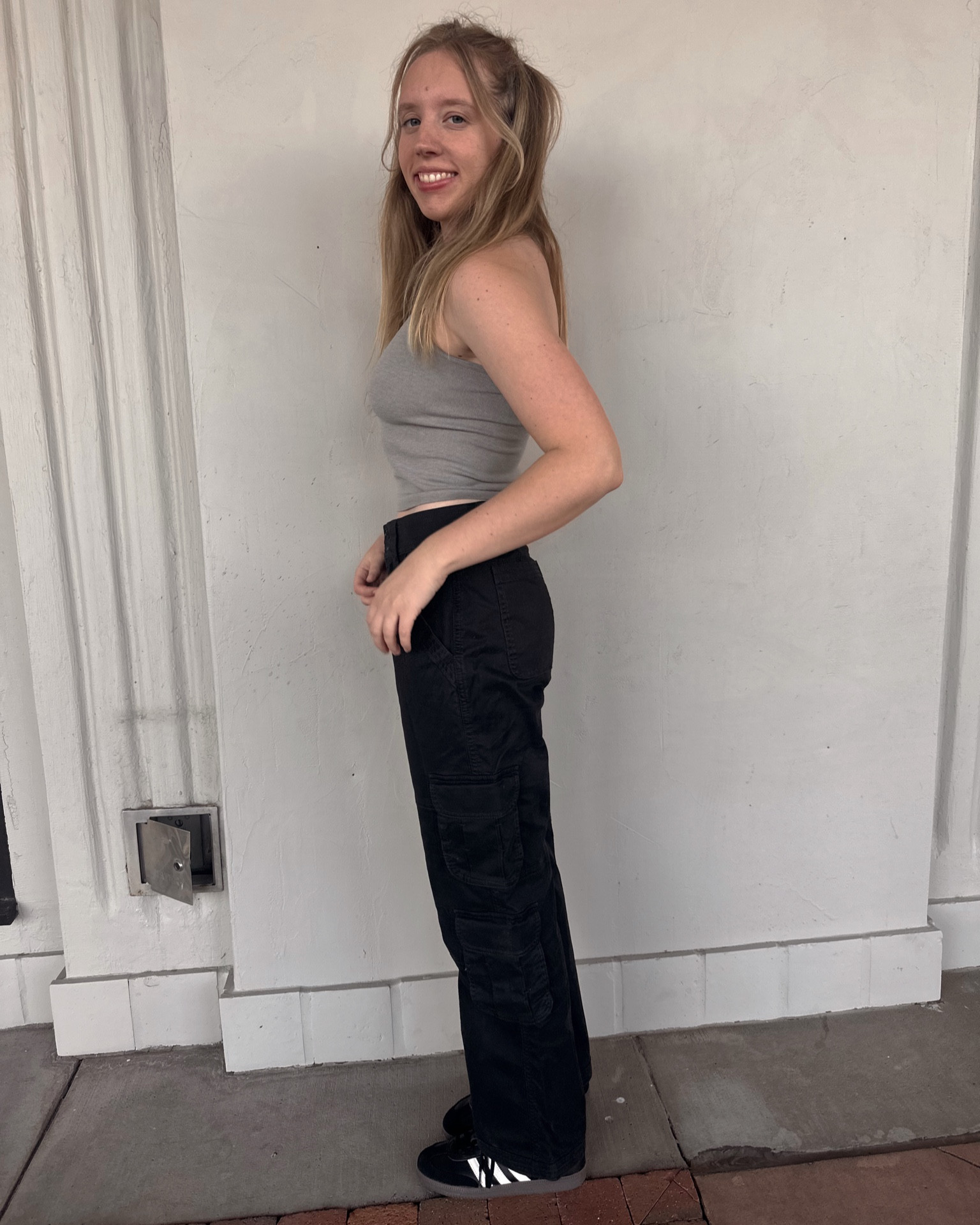 Casual, trendy look: wear alone or use as a base layer. How to style cargo pants. How to style adidas sambas. Free people brami  

#LTKfindsunder100