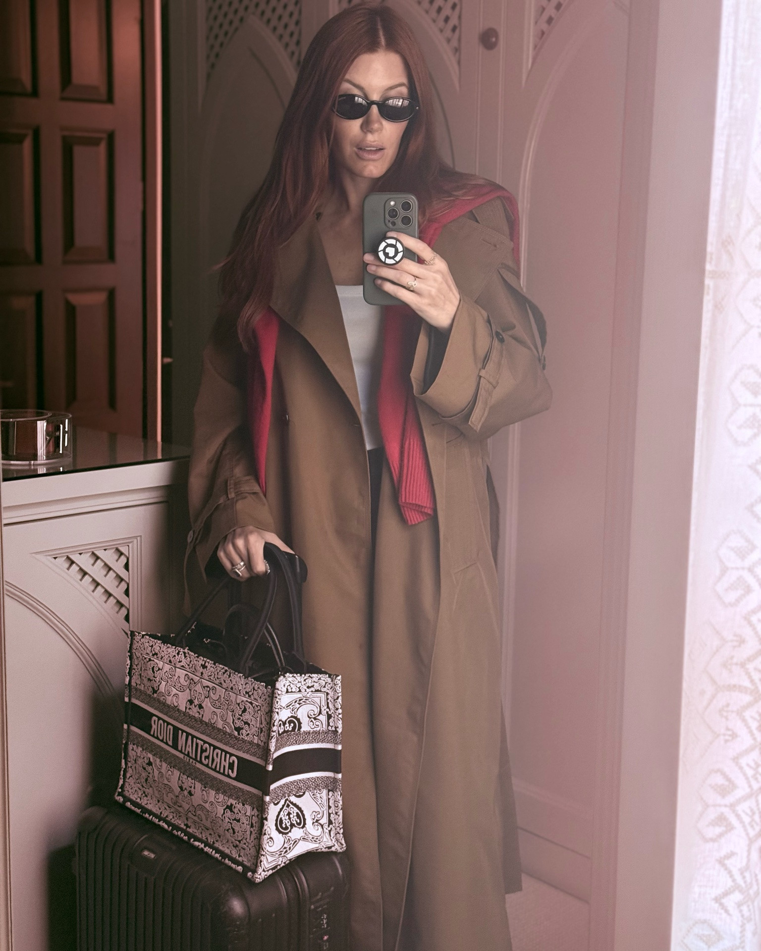 Head to the LTK London office and can’t wait to see the team ✨

A new outfit notes:
- red is trending so I added a touch via this cashmere sweater that will be perfect for an overnight flight 
- always bring a trench to London. This one has a removable fur collar and I also just ordered a new one, tagged here
- this is the Zara tank I told you you mush have and I wasn’t kidding it is perfection 
- my jeans are the V waist YSL and they have an epic puddle at the bottom 😍
- Yes, I am wearing heels. It’s a short walk to the plane and when I land I’ll be ready for whatever comes my way (tea at my beautiful hotel? ✨🫶)

#LTKdayinmylife #LTKootd