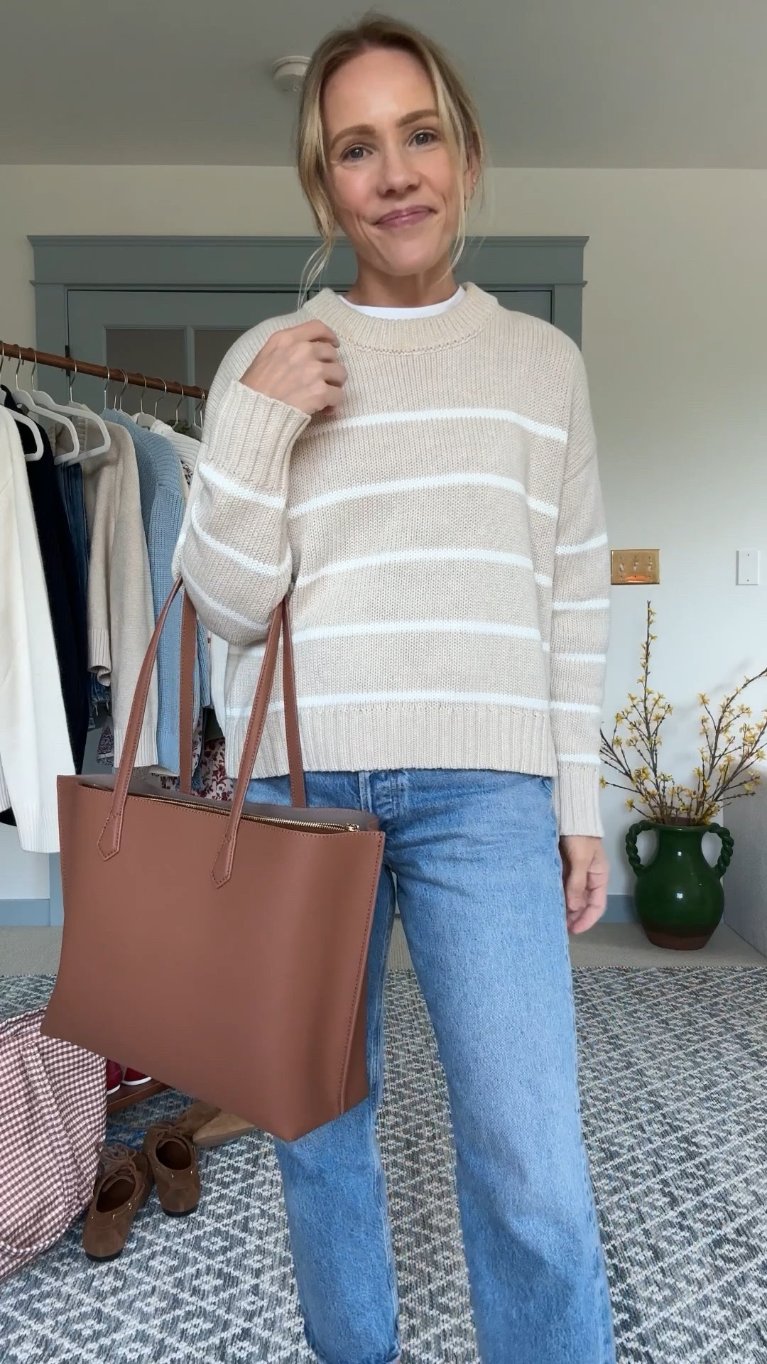 Under $150 Fall leather tote bag with a laptop sleeve

And Pre-Fall try on: under $60 cotton sweaters, incredibly fit, quality and color options. Wearing my regular size small in all styles: 

The classic stripe, the everyday fisherman, the cropped fisherman cardigan, the longer boyfriend fisherman cardigan, and the viral cropped sweater cardigan 

@onequince #quincepartner 