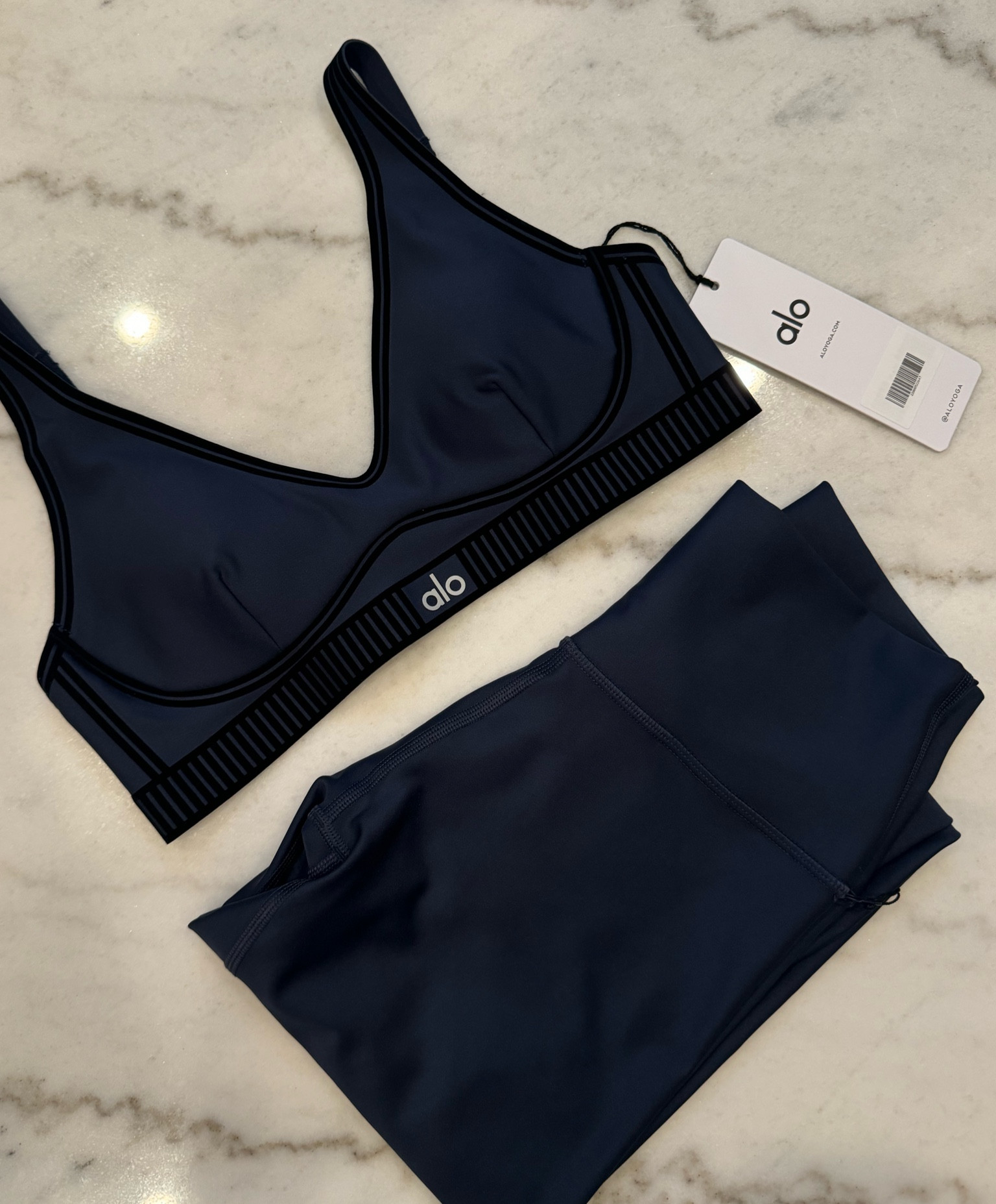 New from Alo! The top has a matching pair of leggings that go with it but I liked the fit of the regular airlifts better 🤌🏼 I got a size small in both! 

#LTKFindsUnder100 #LTKActive #LTKFitness