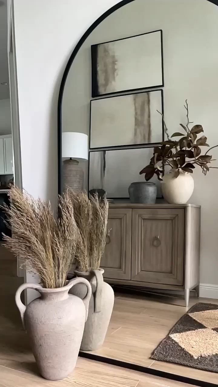 Entryway Decor
Faux fall stems, arched floor mirror, console table, framed art, pottery barn lamp, arhaus vase, grey vase, accessories, budget friendly, neutral decor, transitional decor, home decor, home finds #wayfair  #potterybarn 

#LTKhome #LTKSeasonal #LTKFind