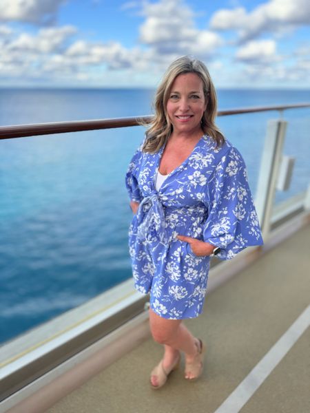 This floral romper has a sexy and plunge and a fun front tie. Hugs the waist and is the perfect travel outfit or cruise outfit. 

#LTKSeasonal #LTKtravel #LTKover40