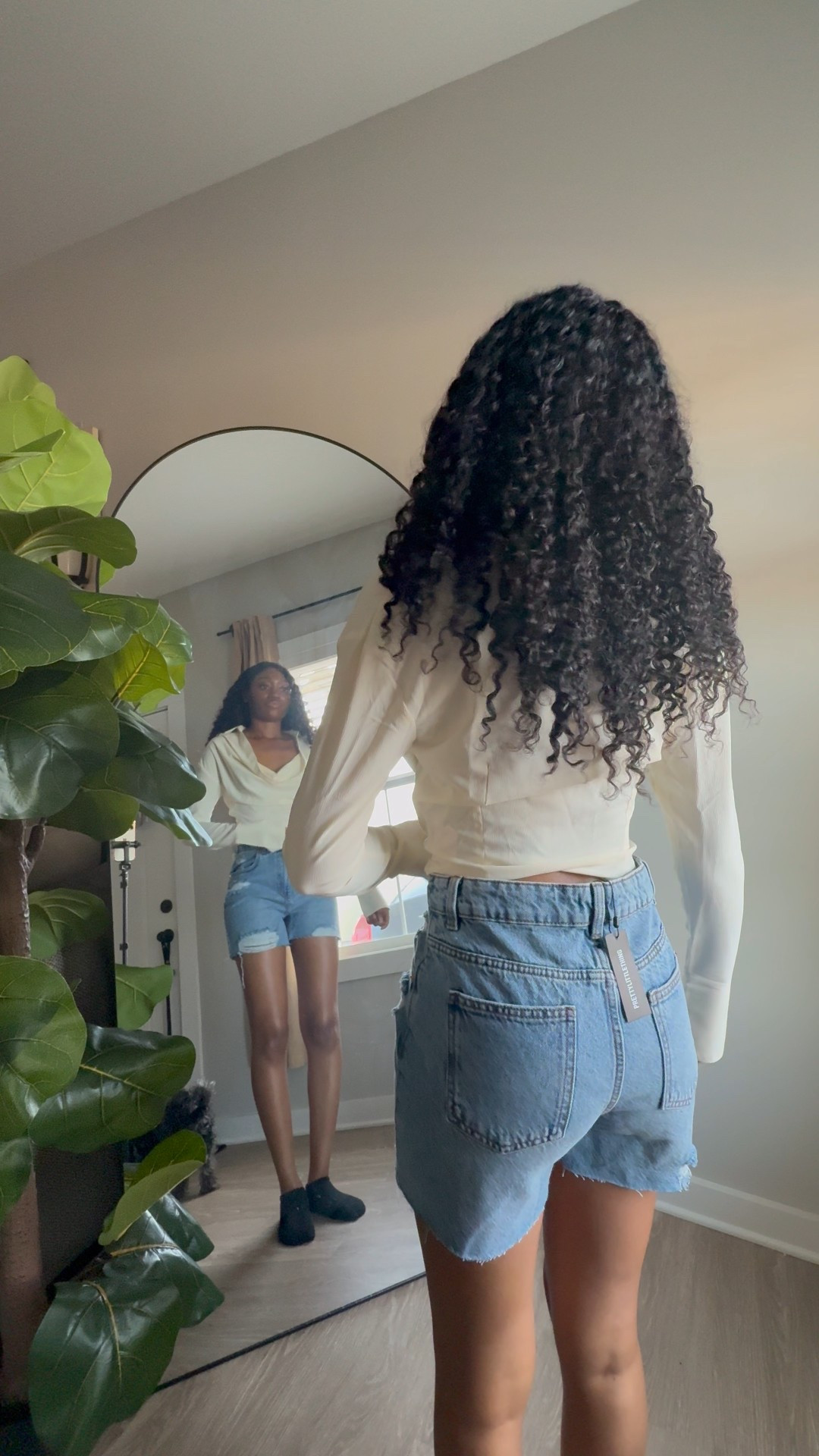 Cream plunge top with blue Jean boy shorts spring top summer top outfit inspo casual date night outfit 

#LTKPetite #LTKFindsUnder50 #LTKStyleTip