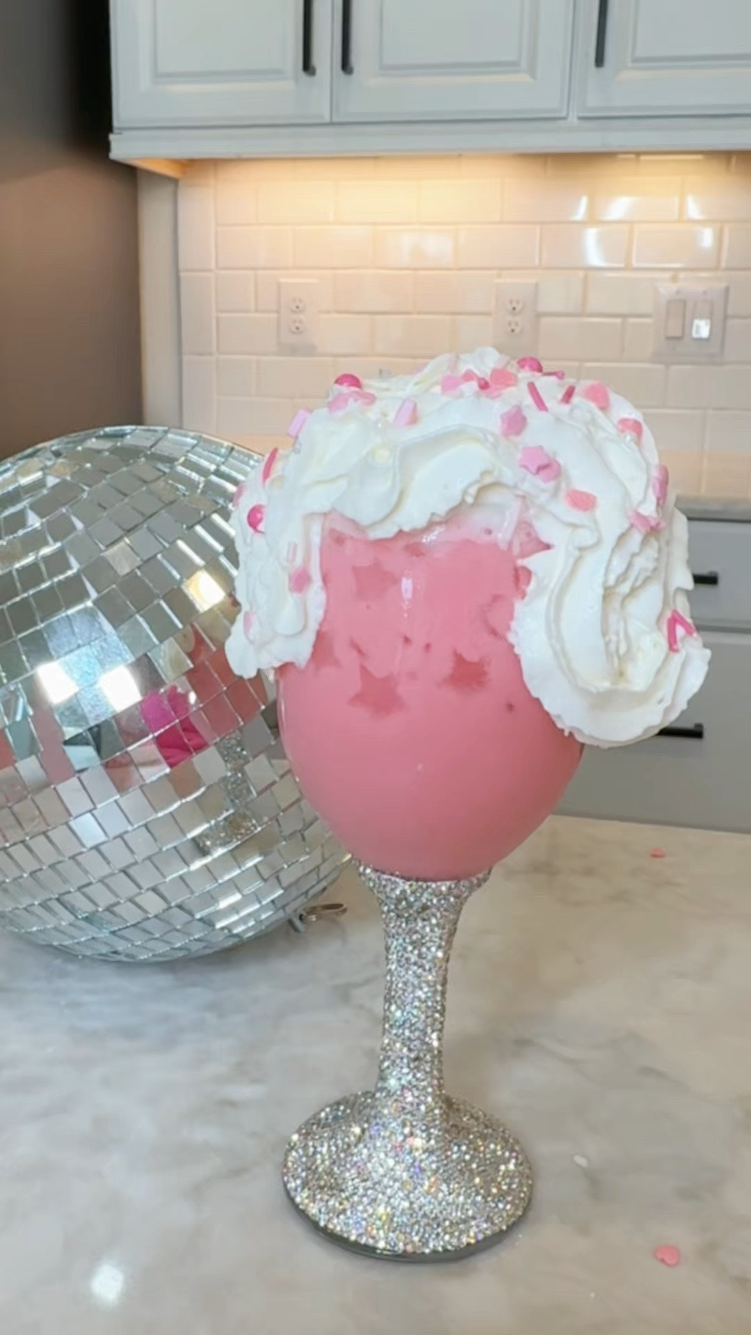 Pink, sparkly & a whole lot of fabulous! Linking all the fun details! My rhinestone wine glass, disco ball cocktail picks, star ice cube molds, sprinkles + hot pink sweatsuit too!🥂💖

#LTKHome #LTKootd #LTKfoodie