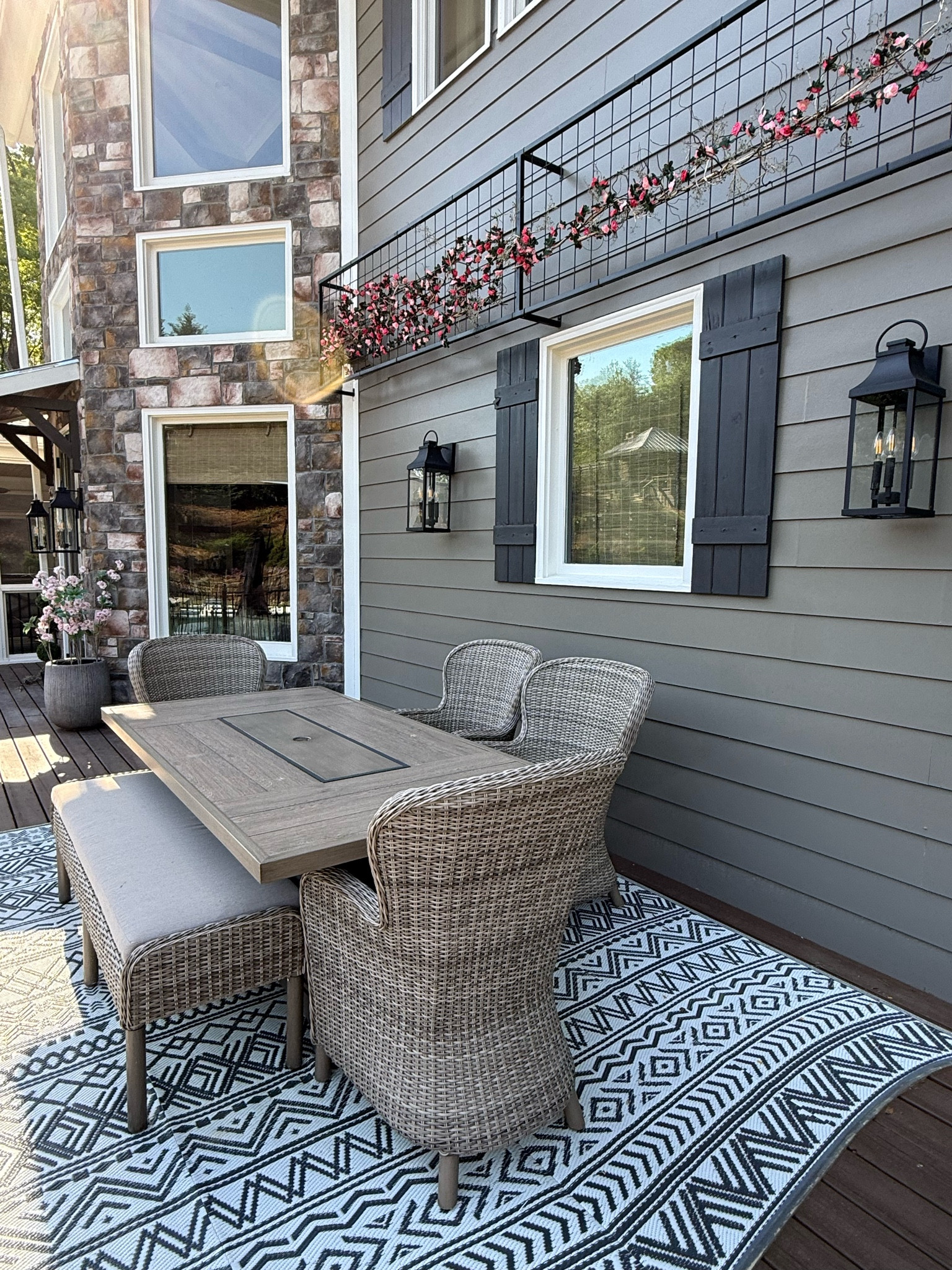 Spring, Fall, and Winter (boringgggg) Trellis, with summer yet to come. We installed this custom trellis last fall, and I am still so happy with it. It was a weird dead zone above the table that needed some more interest. Scroll for the story. I love the whimsical element it adds, and absolutely love eating out here! The table set is soo awesome! I can send you a link to DM when you comment ‘TABLE’ 🌸
.
.
.
#spring #trellis #porchdecor #porchdesign #homeinspo 

#LTKSeasonal #LTKHome